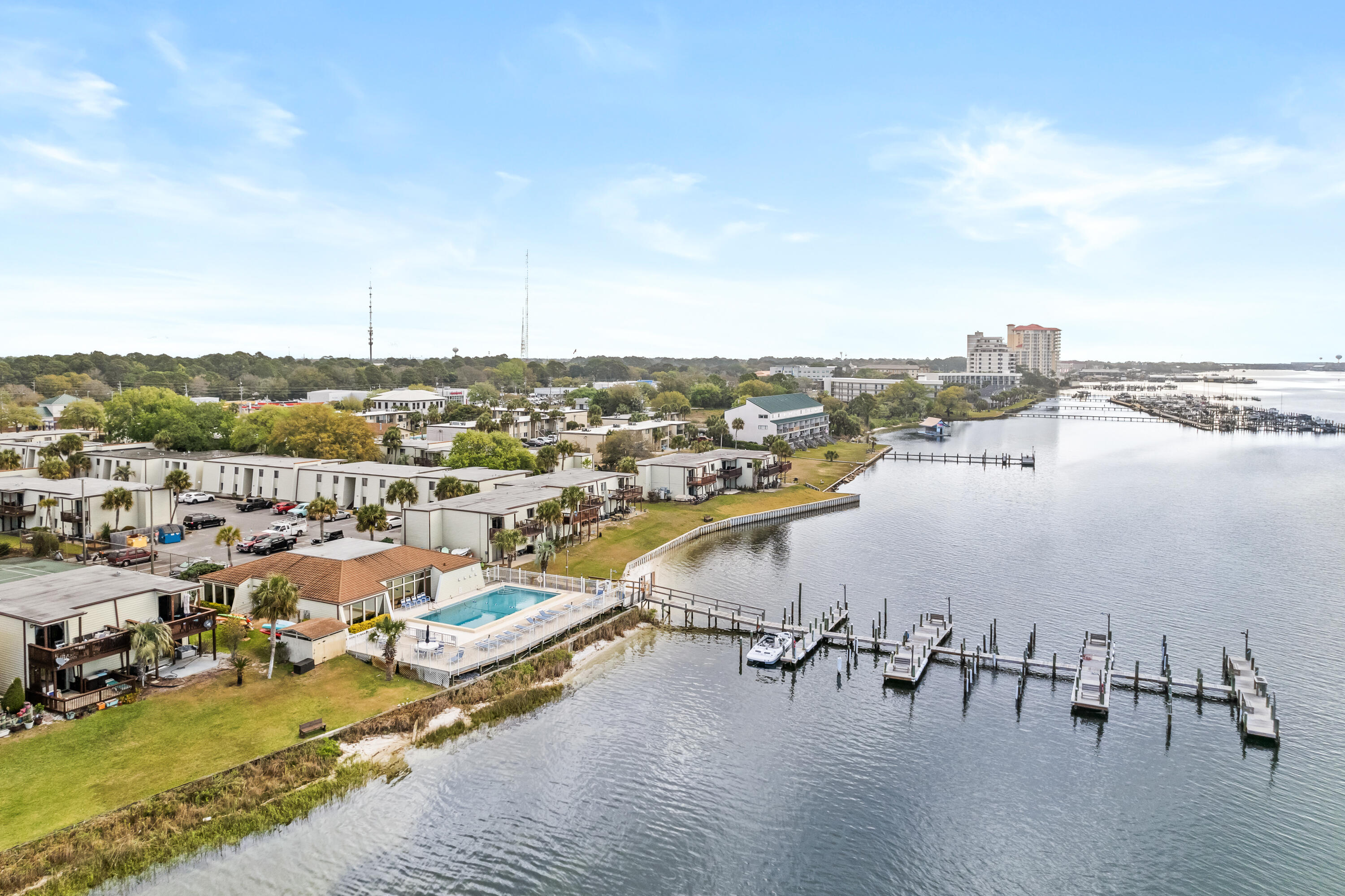 Located on the Santa Rosa Sound, this fully furnished and turnkey 2-bedroom, 2-bathroom second-story condo offers a rare feature within the Fountainhead community: a private in-unit washer and dryer. Unit 19C is currently the only unit in the complex with this feature.

Enjoy the waterfront lifestyle with access to a community boat dock, pool, tennis court, clubhouse, and boat trailer parking. Boat slips may also be available through the HOA upon request, making it easy to spend more time on the water enjoying boating, fishing, paddleboarding, and everything the Emerald Coast has to offer.

This move-in ready condo includes major updates already completed, including HVAC replaced in 2020 and water heater replaced in 2016. The seller is also providing an Achosa Home Warranty at closing for added peace of mind.

Whether you're looking for a primary residence, second home, vacation getaway, military relocation property, or investment opportunity, this condo offers flexibility to fit your needs. HOA dues include water, sewer, and trash service.

Conveniently located near Okaloosa Island, downtown Fort Walton Beach, Hurlburt Field, Eglin Air Force Base, shopping, dining, and the beautiful white-sand beaches of the Emerald Coast.

Affordable waterfront living, boat access, and a truly unique feature set make this Fountainhead condo one you won't want to miss.