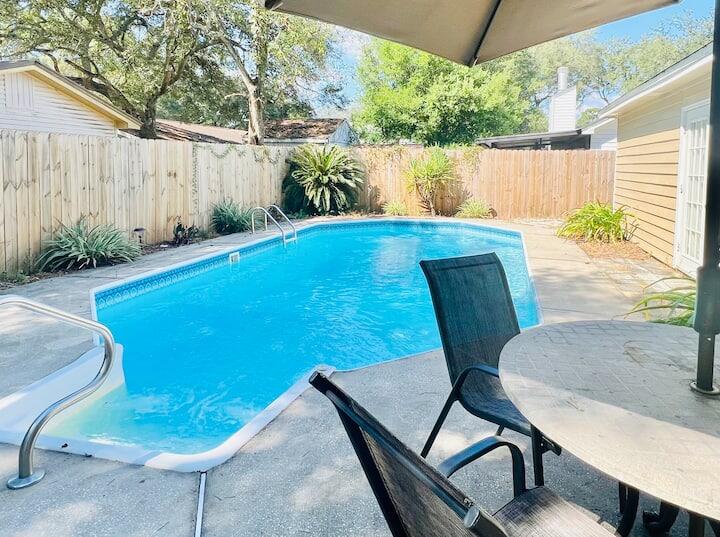 Welcome to your dream rental! 

This beautifully updated 4-bedroom, 2-bathroom pool home offers comfort, style, and convenience, perfectly located in the heart of Niceville. This home is offered unfurnished, and pool care is included in the rent for added convenience and easy maintenance.

Inside, you'll find a bright and spacious layout featuring neutral tones and tasteful upgrades throughout. The home offers a generous living room, a formal dining area perfect for entertaining, and an inviting eat-in kitchen equipped with stainless steel appliances, granite countertops, and modern cabinetry.

The primary suite is a peaceful retreat with a luxurious en suite bathroom featuring dual vanities and private sliding glass doors that lead directly to dual vanities and private sliding glass doors that lead directly to the fenced backyard and sparkling pool, an ideal space for relaxation or gatherings. Three additional guest bedrooms are well-sized and share a beautifully updated full bathroom.

Additional features include a one-car garage, washer and dryer, and a well-maintained pool area. Pets may be considered on a case-by-case basis with owner approval and a non-refundable pet fee. Smoking and vaping are not permitted.

With its prime location close to schools, parks, shopping, and dining, this home offers an exceptional rental opportunity in one of Niceville's most desirable neighborhoods. Schedule your private tour today and make this stunning home your next address!