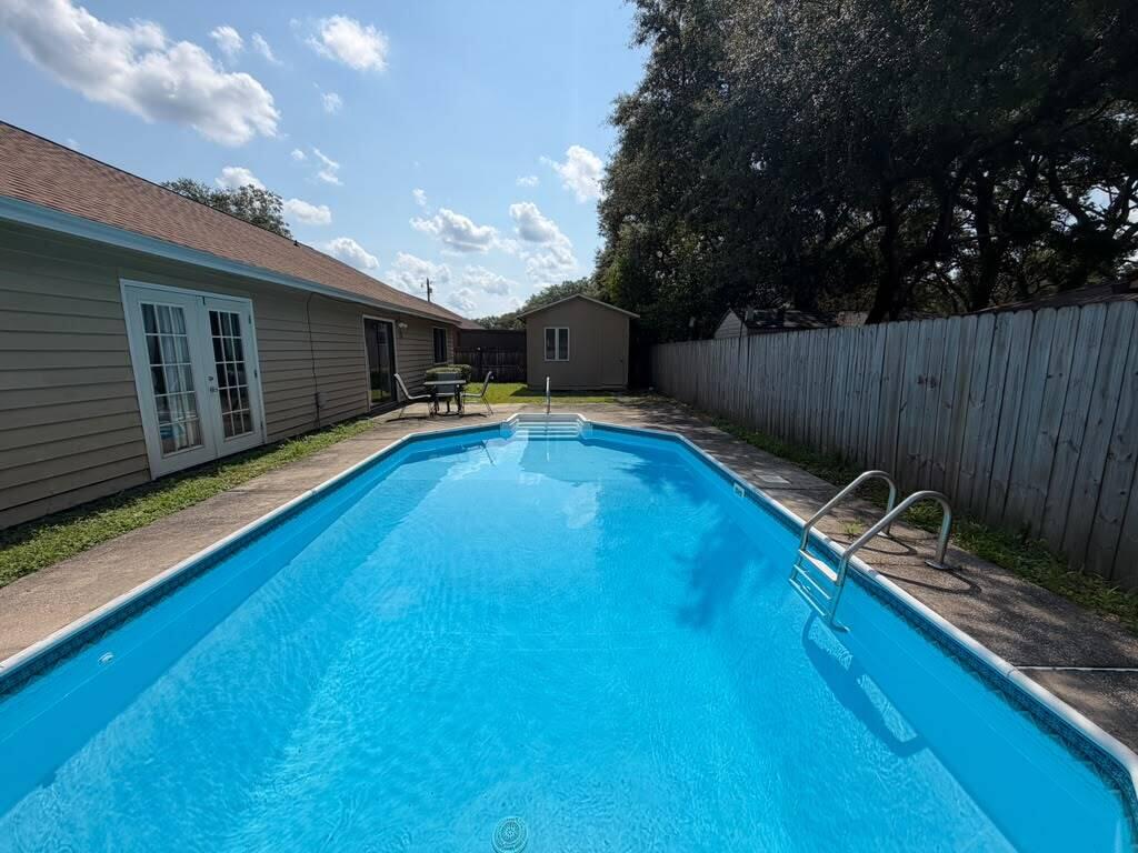 Welcome to your dream rental! This beautifully updated 4-bedroom, 2-bathroom pool home offers the perfect combination of comfort, style, and convenience in the heart of Niceville. Pool care is included in the rent, allowing you to enjoy the backyard oasis without the hassle of maintenance.

Inside, you'll find a bright and spacious layout featuring neutral tones and tasteful upgrades throughout. The home offers a generous living room, a formal dining area perfect for entertaining, and an inviting eat-in kitchen complete with stainless steel appliances, granite countertops, and modern cabinetry.

The primary suite serves as a peaceful retreat with a beautifully updated en suite bathroom featuring dual vanities. Private sliding glass doors provide direct access to the fenced backyard and sparkling pool, creating the perfect space to relax or entertain. Three additional guest bedrooms are generously sized and share a beautifully updated full bathroom.

Additional features include a one-car garage, a washer and dryer, and a well-maintained pool area. Pets may be considered on a case-by-case basis with owner approval and a non-refundable pet fee. Smoking and vaping are not permitted.

Conveniently located near schools, parks, shopping, dining, and local military bases, this home offers an exceptional rental opportunity in one of Niceville's most desirable neighborhoods. Schedule your private tour today and make this stunning home your next address! dual vanities and private sliding glass doors that lead directly to the fenced backyard and sparkling pool, an ideal space for relaxation or gatherings. Three additional guest bedrooms are well-sized and share a beautifully updated full bathroom.

Additional features include a one-car garage, washer and dryer, and a well-maintained pool area. Pets may be considered on a case-by-case basis with owner approval and a non-refundable pet fee. Smoking and vaping are not permitted.

With its prime location close to schools, parks, shopping, and dining, this home offers an exceptional rental opportunity in one of Niceville's most desirable neighborhoods. Schedule your private tour today and make this stunning home your next address!