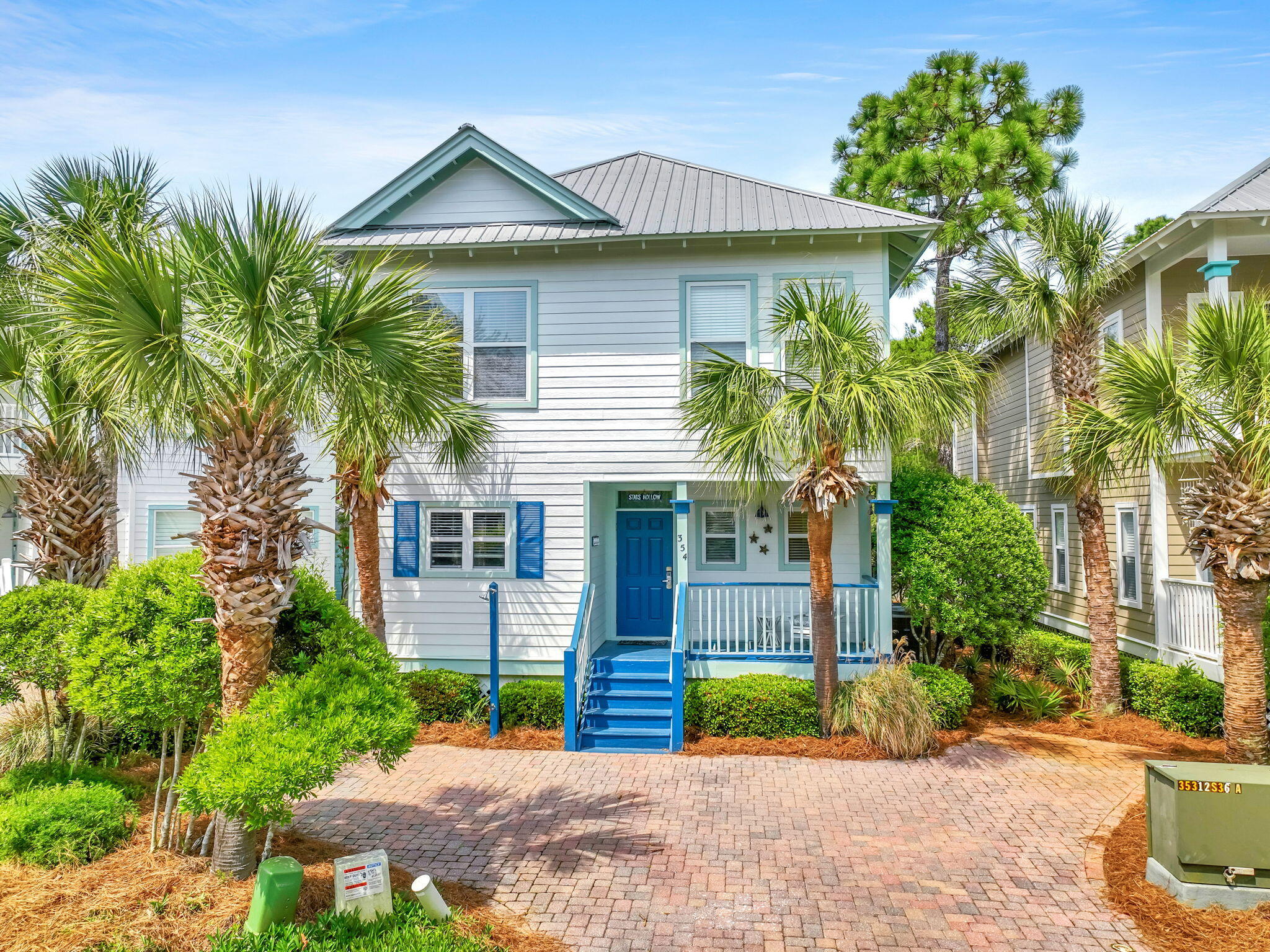 Welcome to Old Florida Village, a highly sought-after gated community in the heart of Blue Mountain Beach. With only 75 homes nestled between palms and 2 pools in this gated neighborhood, you'll fall in love with the colorful coastal cottages and close-knit community the moment you drive in. This beautifully maintained 3-bedroom with hallway bunk beds, 2.5-bath coastal cottage blends classic beach charm with modern comforts and is ideally located just a short distance from the Gulf of Mexico and the sugar-white sands of the Emerald Coast. You'll love the proximity to Blue Mtn Beach Reg Bch Access, providing convenient amenities-restrooms, bike racks, and parking, perfect for stress-free beach days. Rental Projections up to $95K gross. Additionally, nearby Gulf Place is home to a variety of restaurants, shops, and entertainment, making it easy  to enjoy all the coastal and vibrant vibes the 30A area has to offer.

Inside, the home features a spacious open-concept living area designed for relaxed beach living. The kitchen showcases a striking stone waterfall breakfast bar, white wood cabinetry, stainless steel appliances, and stylish rattan light fixtures that enhance the coastal feel. Shiplap accents in the kitchen and primary bathroom add charm, while updated fixtures throughout bring a fresh, modern touch.
The large primary suite offers a private screened balcony, creating the perfect place to unwind after a day at the beach. The en-suite bathroom features a beautifully tiled shower and a bright, airy feel.

The home is located in a golf cart-friendly community. The garage provides ample storage or space for golf cart parking, giving you everything you need to enjoy the neighborhood lifestyle and all the colorful and vibrant places that 30A has to offer.

Whether you're looking for a primary residence, a vacation getaway, or an income-producing investment property, this home offers excellent rental potential and is already part of a strong rental program.

Don't miss this opportunity to own your own slice of paradise just moments from the Gulf and the stunning beaches of the Emerald Coast. Schedule your showing today! Showings are available March 26-April 1st, April 11-14, April 20-30 but may become rented anytime so make sure you confirm with your agent on availability.
