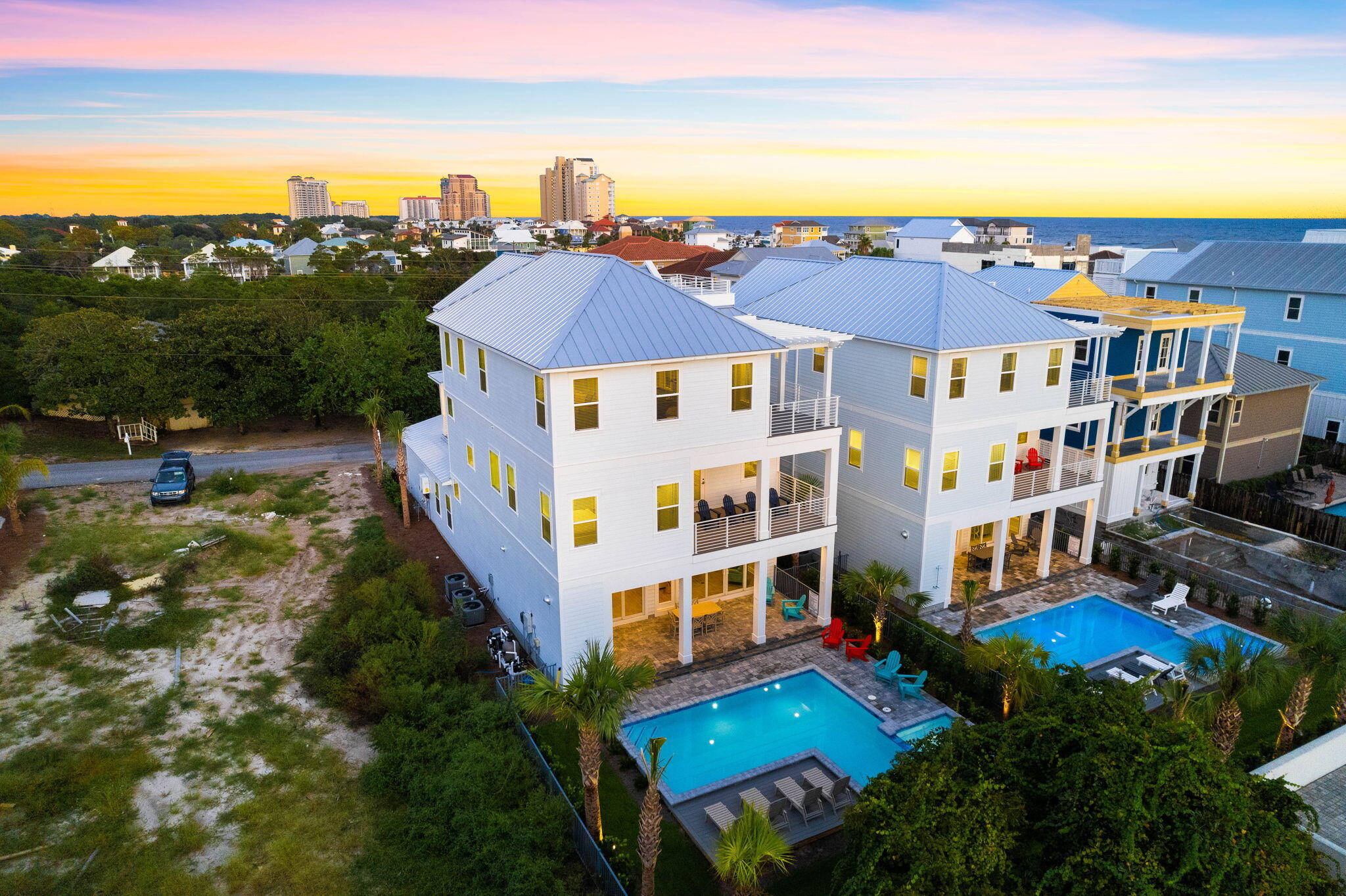 Experience refined coastal luxury at 134 Sandtrap Road in Miramar Beach. Built in 2023, this stunning six-bedroom, seven-and-a-half-bath residence blends modern elegance with timeless Gulf-inspired design. Soaring 11-foot ceilings and an open-concept layout create a bright, spacious atmosphere with seamless indoor-outdoor living. Designed for entertaining and relaxation alike, the home features a private heated pool, built-in outdoor kitchen, and multiple inviting gathering spaces. Every detail was thoughtfully curated to deliver the ultimate luxury beach lifestyle near the sugar-white sands of the Emerald Coast The oversized two car garage offers a rare luxury in Miramar Beach; the home boasts four parking spaces in the driveway in addition to the covered parking and security that the garage offers. A private elevator grants easy access to all three levels of the home, ensuring both comfort and accessibility for all residents.

On the third floor, the generously sized 30'x20' family room and bunk room that can accommodate up to four additional guests provide a second entertainment and living room option.

This home takes the luxury vacation experience to new heights with the rooftop viewing deck offering views of the Gulf of Mexico.

This home is more than just a dwelling; it's a testament to refined living and the art of indulgence. Discover coastal living at its finest, where sophisticated architecture meets the tranquil allure of the Gulf. Don't miss your chance to own this unparalleled masterpiece. Schedule a private showing, and come experience luxury redefined.