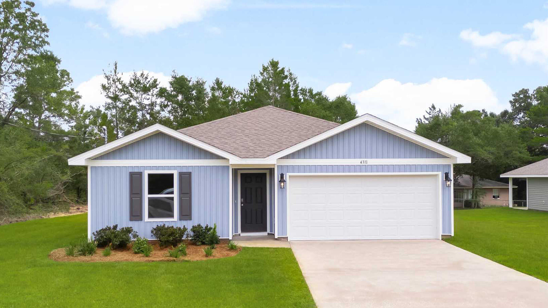 Welcome to 10 Country Side Way at Magnolia at the Bluffs in Freeport Florida. This pre-construction homesite offers the opportunity to secure new construction prior to groundbreaking. This property will be developed with the Freeport floorplan. 
Entering this home, you find a wide foyer and two spacious bedrooms off the entry hall. The guest bedrooms are spacious and feature ample closet space. Continuing through the entry hall, a third bedroom, ideal for a home office or flex space, is located on the adjacent hall that hosts the laundry area for a full-size washer and dryer near access to the two-car garage. Passing the fourth bedroom you will enter the open concept living area that serves as the heart of the home. From the dining area, step out to the back patio, where you can enjoy the serene surroundings of this growing community. 

The kitchen stands out with a center island that offers plenty of prep space and bar seating. Features include EVP flooring throughout the shared areas of the home and quartz countertops are complemented by the white cabinetry. 
The primary bedroom has an ensuite bathroom with a single vanity, large shower, and a walk-in closet designed for optimal storage.