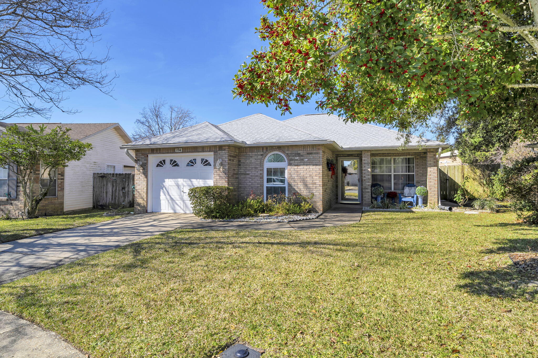 Charming all brick home conveniently located in the heart of Destin. Close to the beach, schools, shopping, restaurants and many Destin attractions. Walk to restaurants, churches and grocery shopping, High ceilings help to make this cozy home seem larger and more spacious. Handicapped equipped, wider entrance, 36'' doors to every room, & bars in bathrooms. Can convey partially furnished. Nice mature landscaping. Fenced back yard and attached storage shed. Located in Flood Zone X, two owner home, never rented, never flooded. New roof in 2025.