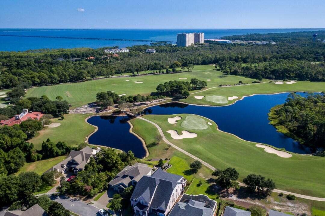Rare Bay front Home site in Kelly Plantation - A Once-in-a-Lifetime Opportunity
We are proud to present one of the last remaining Bay front home sites from the original Kelly Plantation master plan--located within one of Destin's most prestigious gated golf and tennis communities. This is the one of the last available waterfront lot, ideally positioned on a quiet cul-de-sac along Sawgrass Way and surrounded by beautifully crafted luxury homes.

This exceptional property offers breathtaking, unobstructed views of the Choctawhatchee Bay from both the main living areas and future primary suite--without interference from the Mid-Bay Bridge. It provides the perfect canvas to design and build your custom dream home, tailored entirely to your vision and lifestyle.

Spanning approximately 0.48 acre and 102 feet of direct Bay frontage, the home site can accommodate a substantial estate residence in the range of 4,000 to 6,500 square feet (subject to HOA guidelines). A new vinyl seawall, that is currently being completed by a licensed marine contractor at a cost of approximately $50,000, further enhances the property's value and readiness for development.
Kelly Plantation is renowned for its lush landscaping, natural beauty, and world-class amenities, including:

    A neoclassical-style clubhouse

    An 18-hole championship golf course

    Resort-style swimming pool and fitness center

    Five tennis courts

    Four pickle ball courts

    Scenic walking and biking trails, parks, and bay front boardwalks

Residents enjoy 24-hour gated security and a serene, nature-rich environment, all while being conveniently located in the heart of Destin. The community offers direct access to the bay, perfect for boating, kayaking, fishing, and dolphin watching.
Just across Highway 98, you'll find Destin's famous emerald-green waters and white sandy beaches,along with premier shopping, dining and entertainment at nearby Destin Commons. The airport is also just a short drive away, making travel effortless.

Opportunities like this are exceptionally rare. Secure your place in one of Destin's most sought-after communities and create a legacy waterfront home that will be treasured for generations.