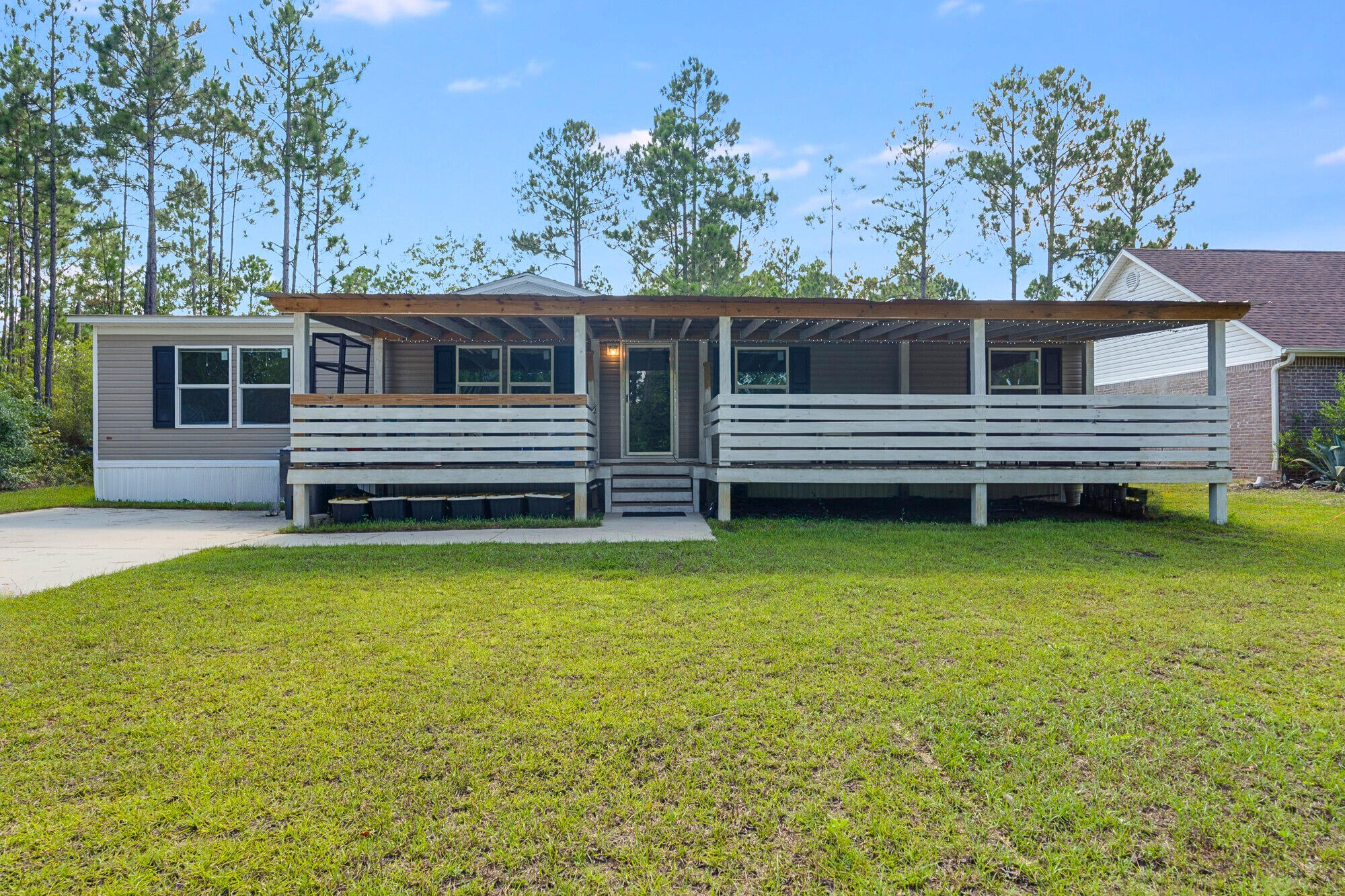 Just minutes from the sugar-white sands of 30A and some of Santa Rosa Beach's favorite local dining spots, this beautifully maintained four bedroom, two bath home offers an exceptional blend of privacy, comfort, and coastal adventure. Tucked into a quiet neighborhood with a secluded feel, the property boasts 75 feet of frontage on Dauphin Canal—perfect for launching a paddle board or kayak right from your backyard. North Eden Park is just down the street, providing easy access to the open waters of Choctawhatchee Bay.

Built in 2022, the home features a bright, open-concept layout with durable LVP flooring throughout. The spacious kitchen flows effortlessly into the living and dining areas, creating an inviting space for everyday living or entertaining. The primary suite includes an ensuite bath with a generous walk-in closet, and the home has been thoughtfully cared for since day one. Whether you're seeking a full-time residence, a low-maintenance second home, or an investment opportunity, this property delivers a lifestyle centered on relaxation and outdoor enjoyment. Enjoy morning coffee on the front porch, sunset paddles along the canal, and close proximity to beaches, boat ramps, scenic trails, Publix, Grand Boulevard, and beloved local favorites like The Bay, Shunk Gulley, and Stinky's Fish Camp. A true hidden gem in one of Santa Rosa Beach's most accessible yet quietly tucked-away locations, this coastal retreat is ready for its next chapter.                                                                                       

Furnishings and the RV currently on site are negotiable, offering a convenient opportunity for a simplified or turnkey move-in. 
Information contained within this listing such as lot dimensions, is deemed to be accurate but is not guaranteed. Buyer to verify.