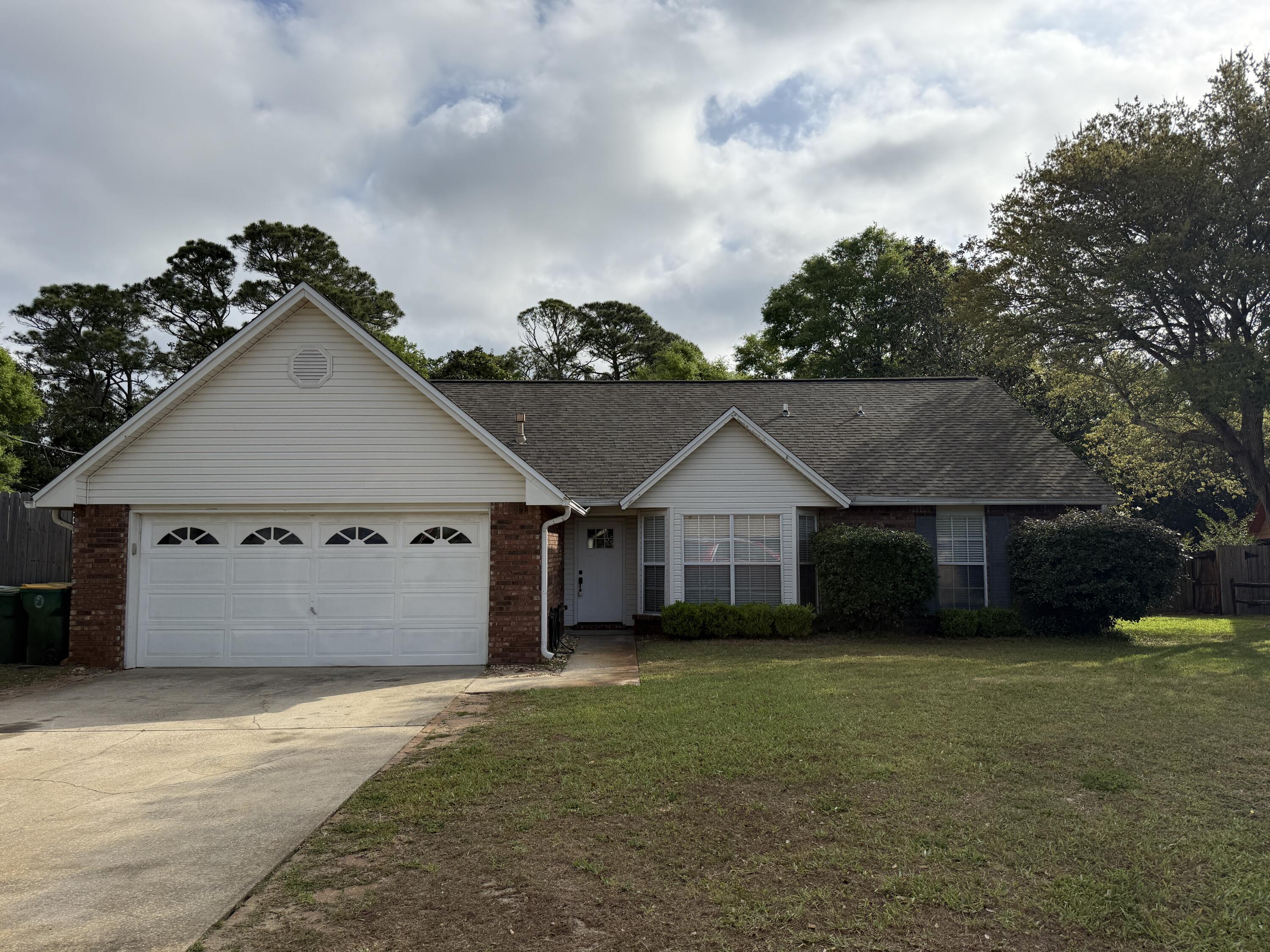 Available 06/22/26 ......Easy commute to Hurlburt AFB, this home features vaulted ceilings, loft, flex space for a home office or 5th bedroom.  Large bedrooms, Florida room and many upgrades.  Renovated kitchen, stainless-steel appliance set and plenty of room.  Large backyard which is perfect for entertaining and grilling on the paver stone back patio.  Privacy fenced back yard, 2 car garage and 5 minutes from the base.  Eat in kitchen as well as a formal dining room.  Open concept living room with the master bedroom on the 1st floor.  Cozy fireplace with custom accents for Florida winters.  No inside smoking or vaping.  Pets allowed with a $400 non-refundable pet fee and owner approval.  Minutes from the beautiful Emerald Coast beaches.