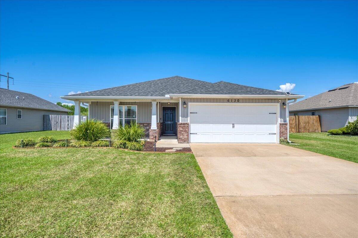 This 2020-built home in Heather's Place offers a spacious and functional layout in a central Gulf Breeze location! Inside, you'll find an expansive open floor plan designed for both everyday living and entertaining, along with brand new carpet in all four bedrooms. The kitchen offers abundant cabinetry, granite countertops, a large island, pantry, breakfast bar, and a nearby dining nook, providing plenty of space to gather and host. The living room is bright and inviting with recessed lighting, a vaulted ceiling, and direct access to the covered back porch! The split floor plan provides privacy, with the primary suite tucked away at the rear of the home. The bedroom includes access to the covered patio and a spacious en suite bathroom featuring double granite-topped vanities, a garden tub, a tiled walk-in shower, a private water closet, and dual oversized closets. Three additional bedrooms are located at the front of the home and share a full bathroom with a tub/shower combo. Outside, enjoy a fully fenced backyard with a storage shed and a covered porch perfect for relaxing. The home also includes a two-car garage, a grinder pump (2023), and a sodded front and back yard, adding to its curb appeal and functionality. VA Assumable loan available! Located just 8.5 miles from Navarre Beach and a short drive to major Northwest Florida military bases, this home is conveniently located and ready for its next family!