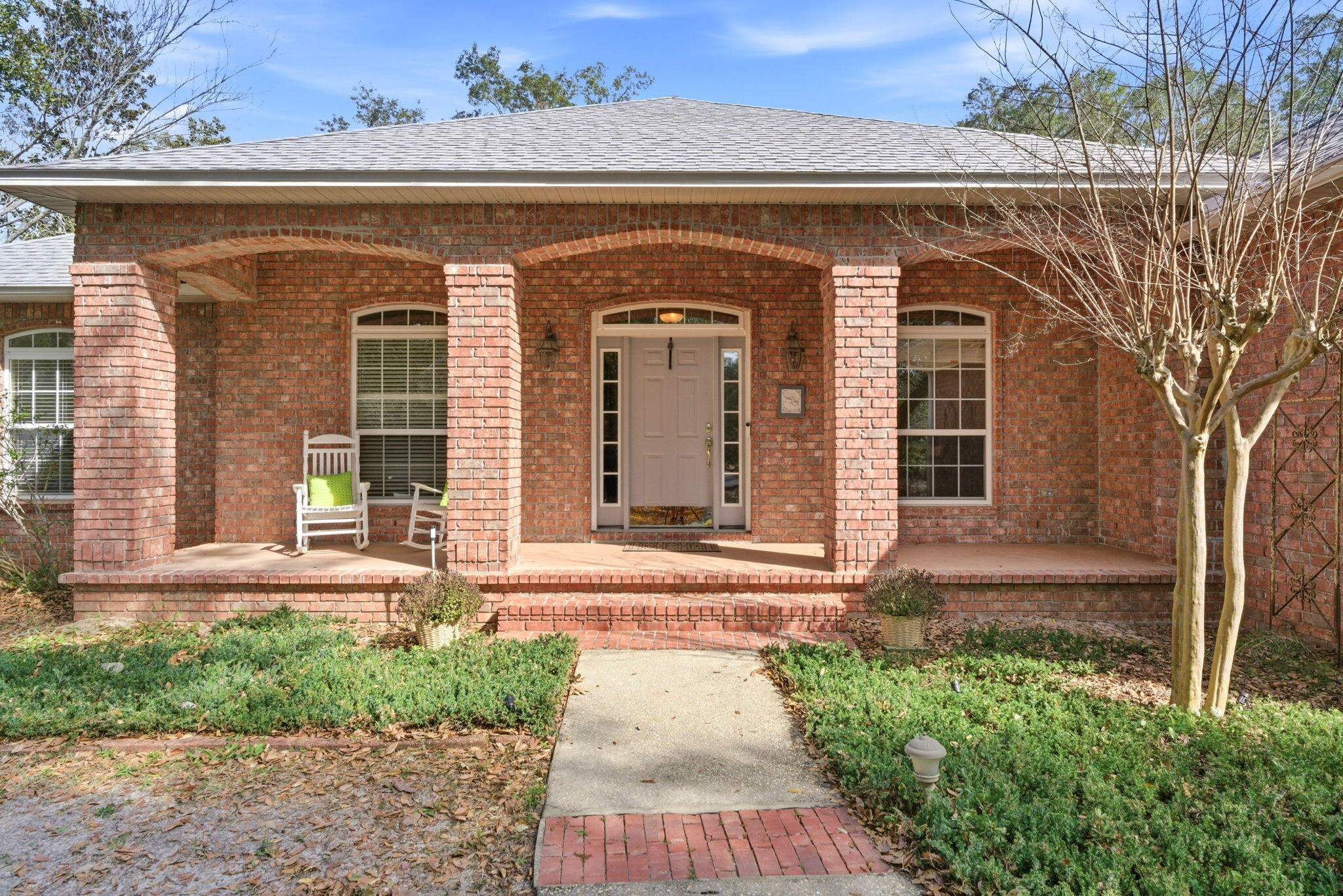 Welcome to Robledal Estates--one of Navarre's most beloved and historic bayside neighborhoods.

Rich in character and timeless charm, Robledal is known for its winding, curvy roads, towering oak trees, and shaded streets that invite evening walks, dog strolls, and a true sense of community. This is one of the rare neighborhoods where the mature trees were preserved, giving the area its signature canopy and cool coastal feel. Each home here is uniquely designed, and many residents have called Robledal home for 30+ years--proof of just how special this neighborhood truly is. Perfectly positioned in the heart of the Emerald Coast, Robledal Estates offers easy access to local schools, shopping, dining, and quick commutes to both Destin and Pensacola, all while enjoying the relaxed lifestyle of bay living.

This charming property sits on an impressive .69-acre homesite with no HOA, offering space, flexibility, and privacy that are becoming increasingly hard to find.

As you arrive, you'll immediately appreciate the abundance of parking, featuring a side-entry driveway, circular drive for easy in-and-out access, and additional concrete parking. The spacious yard offers endless possibilities--including room for a future pool--and includes a picturesque shed with a swing, adding to the home's inviting outdoor appeal. A second lot enhances the property even further, with new sod being added, a fire pit area ideal for gatherings, and a playset with a turf base, creating a fun and functional outdoor space for all ages. For those with recreational needs, RV power is already available on the second lot, offering a rare and valuable convenience. The sellers also recently added a beautifully screened back porch, creating the perfect space to relax and enjoy the peaceful surroundings.

Inside, the home has been lovingly maintained and has had only two owners, a rare find. It offers three bedrooms plus a bonus office, along with two full bathrooms thoughtfully positioned on opposite sides of the home, ideal for privacy and functionality. The office is enhanced with Ethernet (RJ45) wiring, perfect for remote work or high-speed connectivity. The garage features custom-built shelving, providing smart storage and organization.

Major systems have been well cared for, including a brand-new architectural roof--a huge benefit for insurance savings. The HVAC system has been consistently maintained and operates efficiently, and the water heater is approximately 8-9 years old.

The home is on septic, helping keep monthly water bills low--averaging around $30 per month for a family of four. The septic system is newer (not original), was recently inspected and pumped within the last year, and is conveniently located toward the rear of the property for added peace of mind.

Best of all, this home is not located in a flood zone, meaning no flood insurance is currently required.

Homes in Robledal Estates rarely come available. This is your opportunity to own a piece of Navarre's history, enjoy generous land, and create lasting memories in one of the area's most cherished neighborhoods.