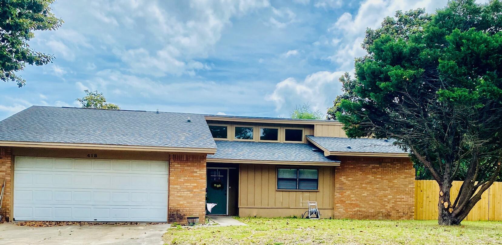 RECENTLY UPDATED 3 BR 2 BA, split floor plan with new LVP flooring in living areas, new tile in bathrooms (no carpet!). Open living/dining areas with vaulted ceiling, fireplace and breakfast bar. New stainless-steel dishwasher and oven/stovetop in kitchen, new tile backsplash and custom vent hood. Master BR also has vaulted ceiling, walk-in closet and new walk-in shower. Guest bathroom has walk-in tub/shower for easy accessibility! Two car garage (with brand new insulated garage door) plus a carport to accommodate boat parking! Location is great for easy accessibility to all areas in Destin for shopping, dining and the beach/bay. New sliding glass door leads to fenced backyard with plenty of room for a pool. Home has a Generac generator and storage shed included.