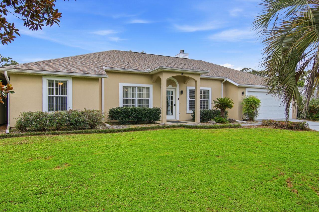 What makes THIS property unique is the Boulevard where it is located, the additional 2 stall detached brick garage, the 1/2 acre of property it sits on and the fact it has NO HOA. Plenty of space for boat and/or RV parking. This is truly an awesome find and is so conveniently located close to schools, shopping and restaurants yet has the feel of seclusion. Enjoy the picturesque yard complete with mature magnolia, crepe myrtle, and walnut trees. All the major components are up to date. Water Heater 2024, Roof 2025, HVAC 2012 and the septic has been inspected and pumped in spring of 2026. This home features 3 bedrooms and 2 bathrooms, large living room with wood burning fireplace, designated dining area, large kitchen offering plenty of cabinets and a pantry. Off of the kitchen is a large laundry room that leads to the attached oversized 2 stall garage. In the dining area are French doors that lead to the enclosed Florida room complete with heat and a/c. From there is a doorway to the enclosed patio area that was designed to be a pool room with drains in the floor that overlooks the back yard with beautiful mature crepe myrtle trees and a palm tree. This property has SO many possibilities.