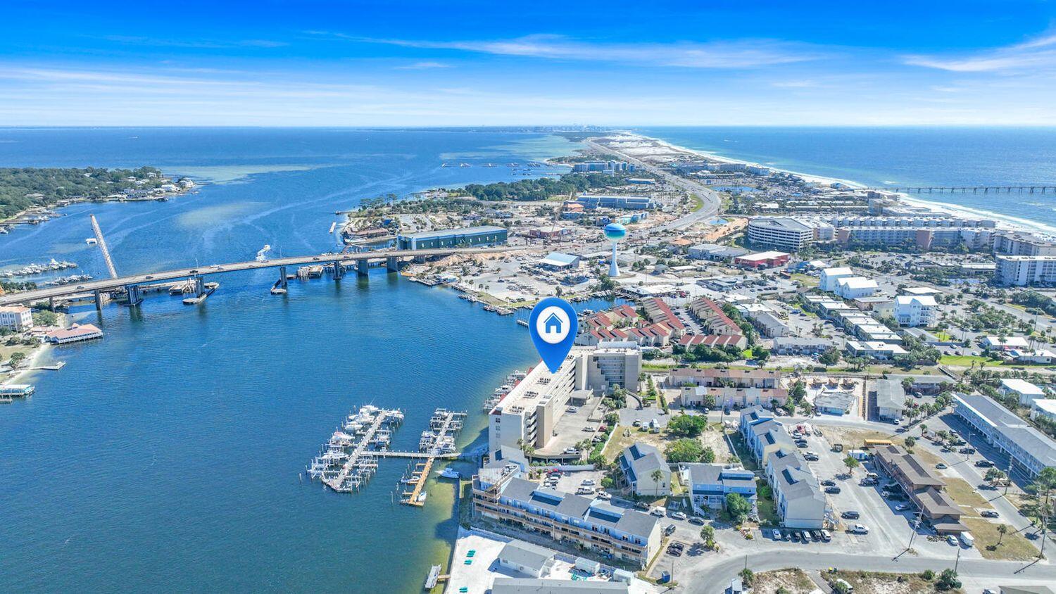 Stunning 2 bedroom, 2 bath condo FULLY FURNISHED with 25' boat slip (#21) & lift - located on the Santa Rosa Sound & perfect for boating enthusiasts! Beautifully updated throughout with a modern, open kitchen with granite, soft close cabinetry, pantry & stackable washer/dryer. Soundfront master suite features large tub & separate tiled shower with lighted mirror.  Second bedroom features ensuite with tiled shower.  Complex is gated, with onsite security and comes with assigned garage parking space (#55) and storage locker (#32).  Additional open guest parking available in front of the complex. Available on 6+ month lease, HOA will not allow tenants to have pets.  Owner will pay HOA dues for duration of lease. *PLEASE REACH LISTING OFFICE FOR LEASE START DATE*