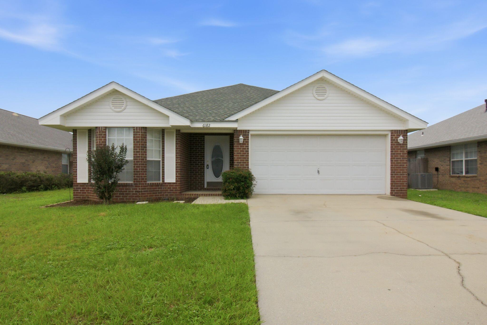 Welcome to Jaimee's Ridge, one of Milton's best-kept secrets. With only approximately 143 homes, this charming neighborhood offers the kind of community feel that's becoming harder and harder to find. Tucked away from the hustle and bustle, yet just minutes from Walmart, Home Depot, restaurants, shopping, and an easy commute to Pensacola, you'll quickly discover why residents love calling this neighborhood home. 

From the moment you arrive, you'll notice the curb appeal. Attractive flower beds, a classic brick mailbox, curb-and-gutter streets, and underground utilities create a welcoming first impression. It's the kind of house that says, 'We've taken care of this place,' before you ever step through the front door.

Inside, the thoughtfully designed split-bedroom floor plan offers 3 bedrooms, 2 bathrooms, and a spacious great room with vaulted ceilings and a wood-burning fireplace. The galley-style kitchen opens to a sunny breakfast nook that's perfect for morning coffee, quick weeknight dinners, or pretending you're only checking one email before work.

The oversized primary suite provides a private retreat with a double vanity, garden tub/shower combination, and a large walk-in closet. New flooring enhances the home's interior with plush, neutral carpeting in all bedrooms and durable vinyl tile throughout the wet areas and laundry room. Fresh professional paint using premium Sherwin-Williams products gives the entire home a clean, move-in-ready feel. Out back, the privacy-fenced yard and open patio offer the perfect setting for grilling with friends, watching kids or pets play, or enjoying a quiet evening after a long day. The backyard is large enough for entertaining but small enough that you won't spend every Saturday pushing a lawn mower and questioning your life choices.

For added peace of mind, the major systems have already been addressed with a 2020 roof, 2017 water heater, and 2012 HVAC system. Additional recent improvements include a new stove, hood vent, refrigerator, and garage door opener (2026), along with new window screens, several new blinds, updated light fixtures, and new front door hardware.

Let's be honest: finding a home that's updated, move-in ready, conveniently located, and reasonably priced isn't getting any easier. If you've been waiting for the right one to come along, don't wait too long--schedule your private showing today and see for yourself why Jaimee's Ridge remains one of Milton's best-kept secrets.
