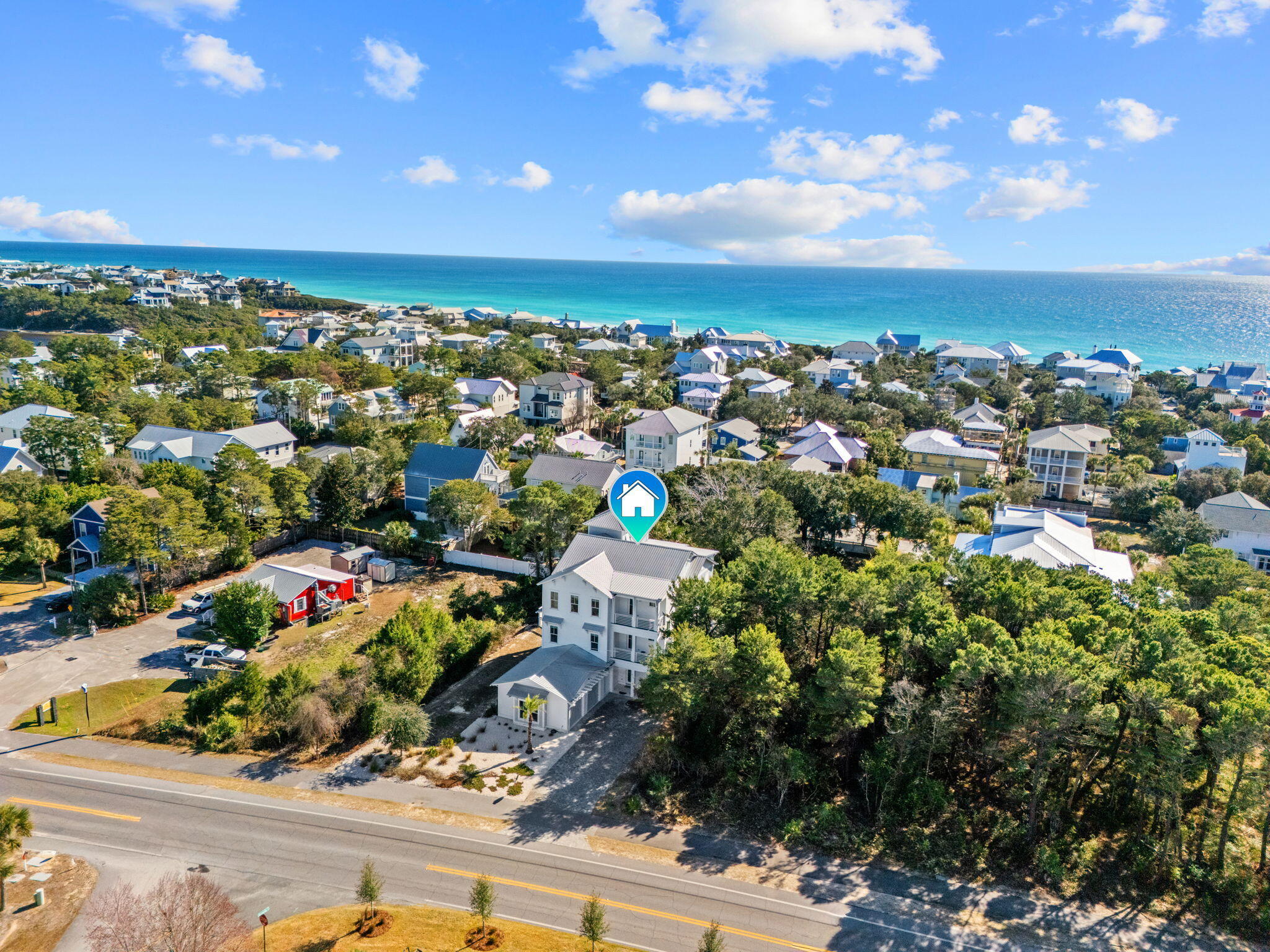 Positioned along iconic 30A and directly on the walking and bike path, this exceptional luxury residence offers a rare opportunity to own a high-performing coastal asset where construction quality, location, and lifestyle converge.

Built with a level of intention and execution rarely seen, this home reflects a commitment to going above and beyond in both design and build. Premium materials, thoughtful systems, and meticulous craftsmanship create a residence that is as durable as it is elegant, making it ideal for investors who value long-term performance without compromising aesthetics. The interior layout is designed for both elevated living and strong rental appeal, featuring seven ensuite bedrooms, including two custom bunk rooms. This highly desirable configuration maximizes guest capacity and income potential. The chef's kitchen is outfitted with top-of-the-line appliances and anchors expansive living and entertaining spaces filled with natural light.

Outdoors, a private backyard retreat awaits with a resort-style pool and spa, an outdoor kitchen, and multiple areas designed for effortless entertaining. A dedicated EV charger adds a modern, forward-thinking amenity that is increasingly valued in today's luxury market.

One of the home's most compelling features is the rooftop entertaining area, where Gulf views and unforgettable sunset vistas create an elevated coastal experience that consistently commands premium interest.

The location is equally exceptional. Just a short, easy walk to the beach and situated directly along the 30A bike and pedestrian path, this home offers effortless access to the shoreline, morning bike rides, and sunset strolls. Nearby dining, boutique shopping, and local culture enhance both lifestyle enjoyment and rental desirability.

Whether positioned as a luxury vacation rental, a legacy second home, or a cornerstone investment along 30A, this residence stands apart for its uncompromising construction, walkable Gulf access, bike-path connectivity, and elevated amenities. It is a truly rare offering in one of Santa Rosa Beach's most sought-after coastal corridors.