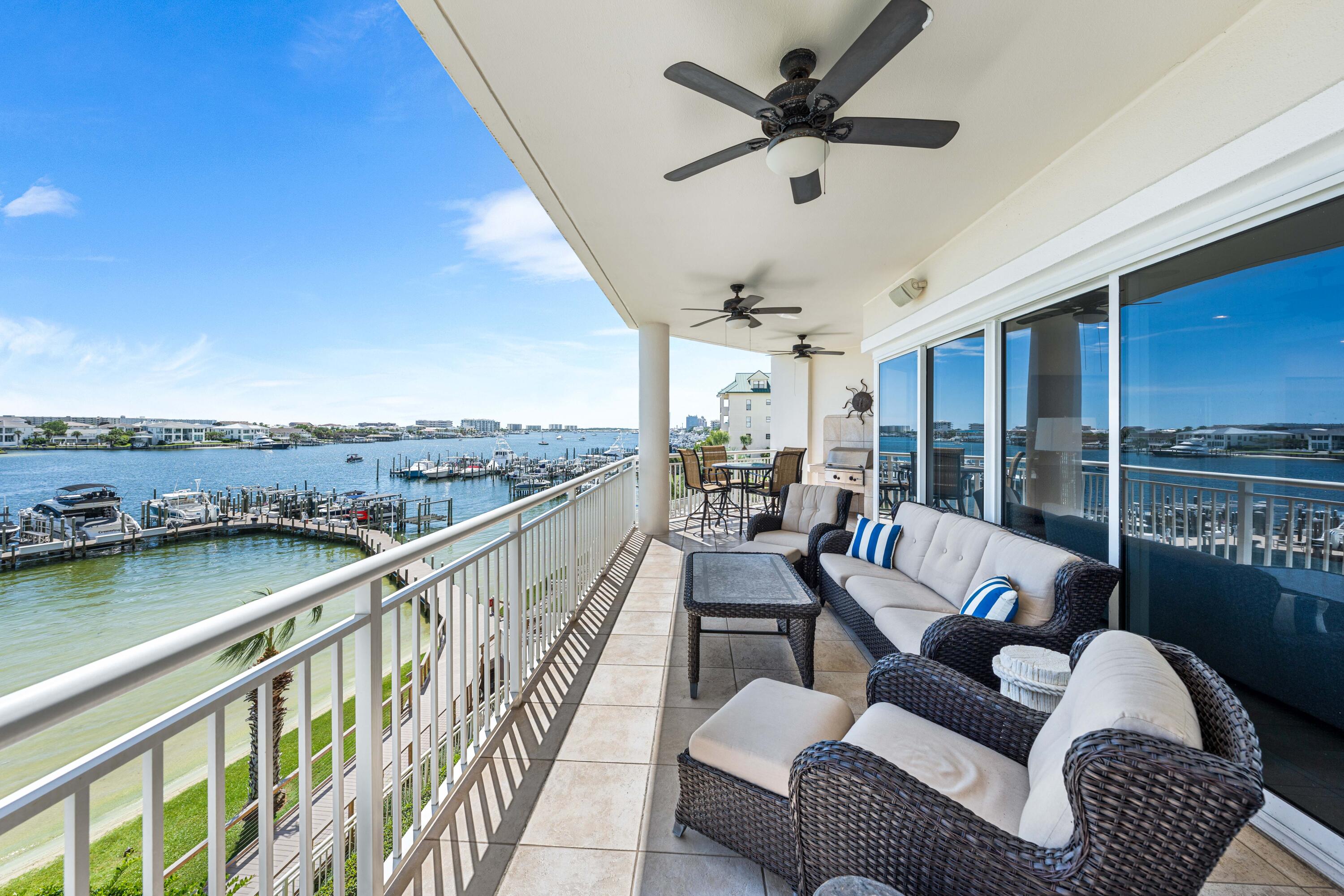 Grand Harbor sits front row to everything that makes Destin Harbor come alive, from seasonal fireworks and boat parades to sunsets that define the view. Inside, 9.5 foot ceilings and an open flowing layout connect the main living space with a chefs kitchen featuring gas cooking and expansive windows that capture uninterrupted water views. The primary suite spans the harbor side with its own balcony, dual walk in closets, and a spa style bath built for true relaxation. Two additional guest suites each include full baths, with the west facing suite perfectly positioned for nightly sunsets. With no short term rentals permitted, Grand Harbor remains quiet and private, offering a true residential feel where mornings are calm and the harbor feels like home. Beyond your door, a heated waterfront pool and hot tub, private marina with boat slips, Tesla charging, and a fitness center are all steps away. The community also offers a clubhouse, conference center, and even a dog park. A reserved guest suite welcomes visiting friends and family, while secure gates and the parking garage create peace of mind.