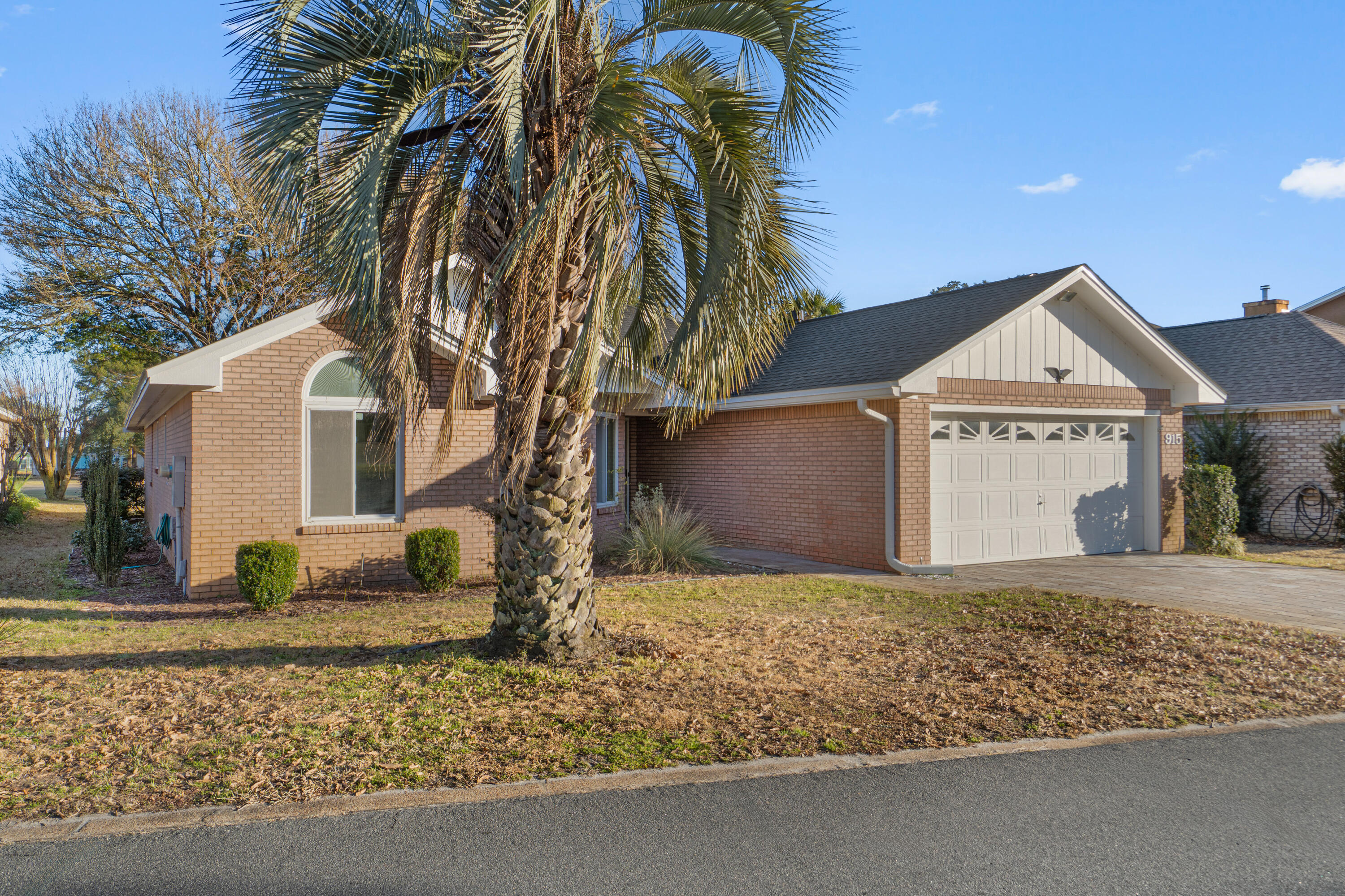 Did you hear? BRAND NEW ROOF + WATER HEATER (installed 2026)! Welcome home to this inviting single-level residence offering comfort, warmth, and everyday ease within a gated golf course community. Perfectly positioned between the third and ninth holes of Shalimar Pointe Golf Course, the property enjoys a peaceful residential setting set away from through traffic.

Built with classic brick construction, the residence blends durability with meaningful interior updates. Other recent improvements include new carpet, renovated bathrooms, and an updated kitchen that brings modern touches into a timeless layout. Inside, cathedral ceilings elevate the main living area, enhanced by recessed lighting and abundant natural light. A bay window defines the dining space, adding architectural charm and creating an ideal setting for both casual meals and entertaining. The heated and cooled Florida room serves as a true extension of the living area, offering year-round flexibility for relaxing, gathering, or enjoying views of the surrounding golf course landscape.

The floor plan includes three bedrooms and two bathrooms, with a well-appointed primary suite and dual closets and private access to the Florida room. Additional property features include new interior paint, epoxy-coated garage floor, sprinkler system, gutters, and a paver driveway.

Located just under 5 miles from Eglin Air Force Base and 13 miles from Hurlburt Field, this property is set in a well-established residential neighborhood with convenient access to shopping, dining, and the area's most beautiful beaches.

Assumable VA loan with 3.75% interest rate may be available to a qualified VA buyer with their full entitlement. This residence offers meaningful updates and single-level living designed for comfort and enjoyment. Call for the video walkthrough!