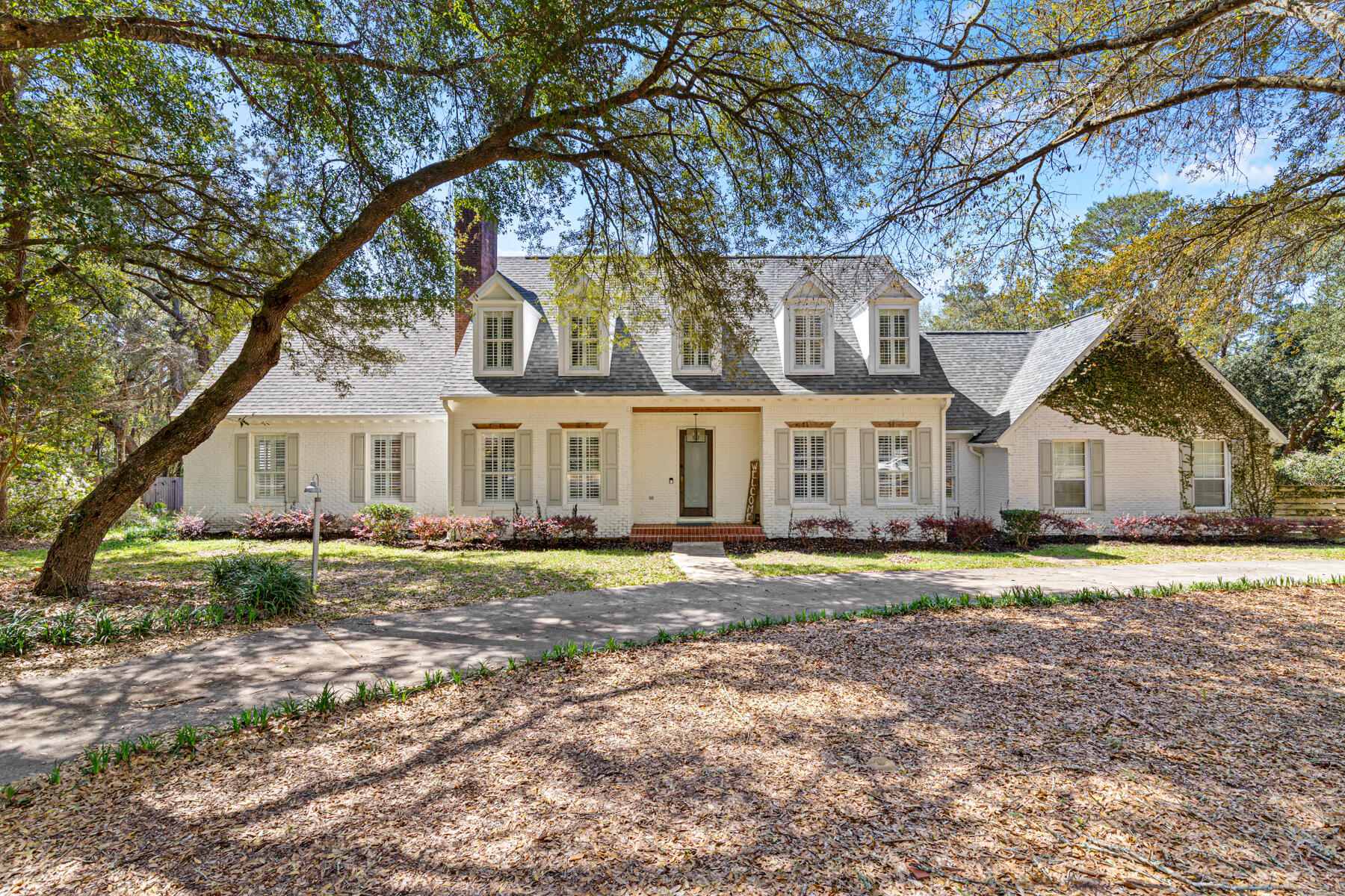 *Sellers contribution of $20,000 toward closing costs and upgrades.*  Welcome to 2624 Edgewater Drive in Niceville's Rocky Bayou on the Bayou community. Situated on .60 acres beneath mature oak trees, this property offers privacy, space, and access to a bayfront community lot with a short walk to the park.

Outdoor living shines with a screened 40,000-gallon pool, multiple deck areas, koi pond, rose garden, and a spacious Florida room featuring a built-in custom indoor hot tub.

Inside, hardwood floors, custom shutters, and fully customized closets with built-in cabinetry throughout complement the open layout. The kitchen features Viking and Sub-Zero appliances. The primary suite includes a spa-like bath with hair washing station and dual shower heads.

Upgrades include a new roof, updated AC and duct system, solar panels, and whole-home Generac generator.

Heated/cooled basement (not in 4,515 sq ft)--ideal for a theater, game room, or man cave.