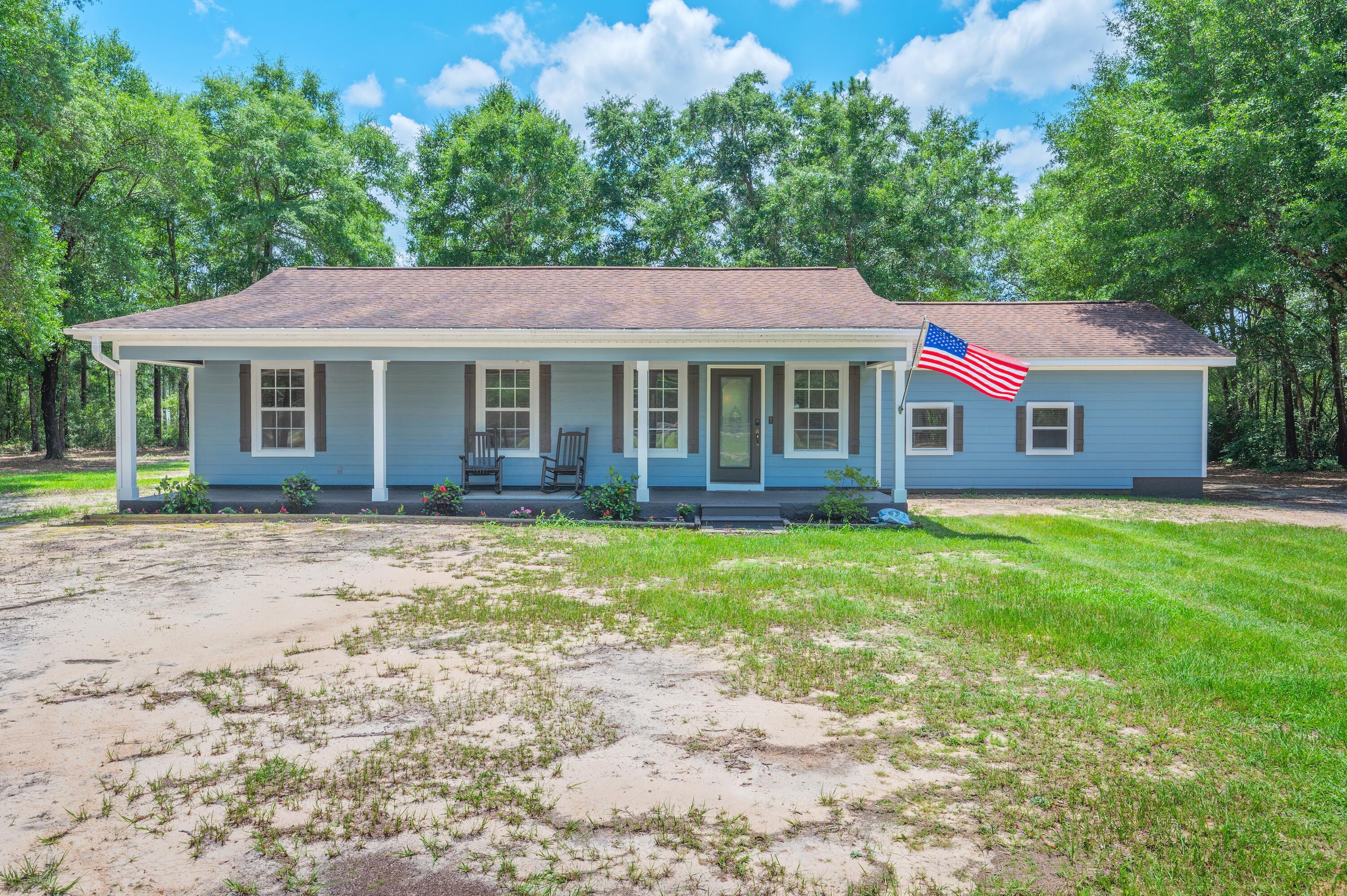 Welcome to this beautifully updated 3-bedroom, 2-bath home situated on just over an acre just north of DeFuniak Springs. Combining modern updates with generous living space, this move-in ready property offers the perfect blend of style, comfort, and functionality. 

The bright, open floor plan features a stunning kitchen with abundant cabinetry, a spacious pantry, stainless appliances, & updated countertops. The adjoining dining and living areas create an inviting space for everyday living and entertaining.

The spacious primary suite provides a relaxing retreat, while two additional bedrooms offer flexibility for guests, a home office, or hobbies. Recent renovations include beautifully remodeled kitchen fresh interior paint, and numerous upgraded finishes that give the home a like-new feel.

A large laundry with storage adds convenience, while the welcoming front porch offers the perfect place to enjoy peaceful mornings or unwind in the evening. Brand new roof with acceptable offer!