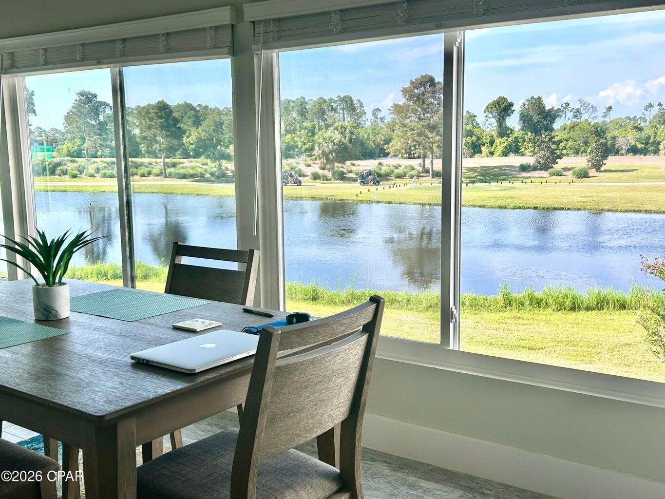 Welcome to your serene retreat in Bay Point, one of the most exclusive gated communities in the area! This beautifully updated 1 BR/1BA condo overlooks a peaceful lake along the renowned Jack Nicklaus golf course and sits just across from the new state-of-the-art South Point Marina on Grand Lagoon. Enjoy quiet mornings with wildlife views in a secure, 24-hour gated community that feels like a world away. Inside, you'll find stylish upgrades throughout--including Shiplap Accents, Sliding Barn Doors, Tile Plank Flooring, 2 Pantries, Quartz countertops and a 6' Long Kitchen Island. The entire condo was completely renovated in 2019. All appliances, including the HVAC and front-load washer/dryer, are less than six years old. The HVAC includes UV Air Purifier. Perfect for full-time living, a weekend escape, or a low-maintenance investment in a premier coastal community, with 2 restaurants in the community. Bay Point annual fee is $1650.  The dimensions are estimated. Measure if important.