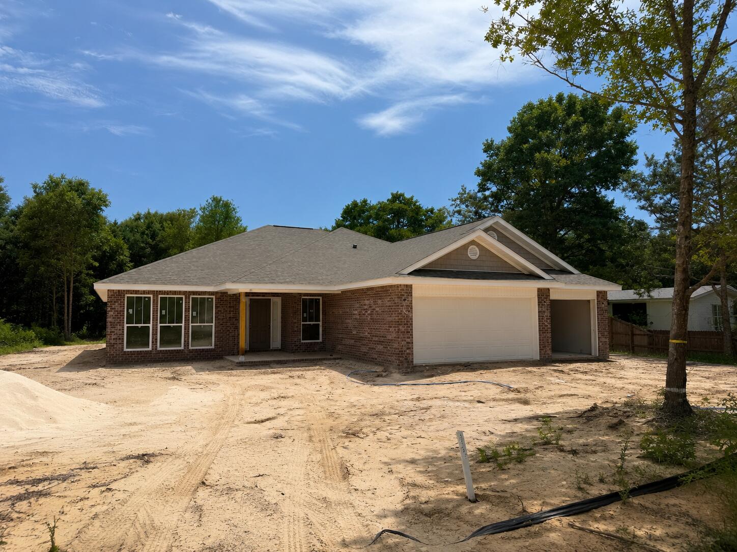 *New Construction - Lot Size 100 x 200 * 2 x 6 Exterior Construction * 3 Car Garage * Split Bedroom Plan with 4BR/3BA + 2 Flex Rooms + Dining Rm + Breakfast Cafe * 10 ft Ceilings in Main Living Areas * Wood Plank Laminate Flooring throughout * Tile in all Baths * Kitchen Features: Granite Countertops, Large Island, Shaker Style Cabinets, Stainless Steel Appliances & Walk in Pantry * Main Suite: Trey Ceiling & Bath with Zero Entry All Tile Walk in Shower with 2 Shower Heads, Separate Soaking Tub, Double Vanities & 2 Walk-in Closets * Ceiling Fans in All Bedrooms, Family Room & Covered Rear Lanai * Granite Countertops all Baths *  Covered Entry & Covered Rear Lanai * Lawn Pump, Well & Irrigation System * No HOA *