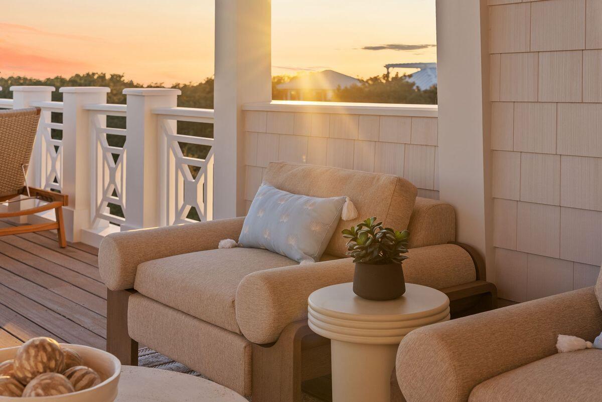 Where Coastal Luxury Meets Elevated Design:
This exceptional retreat in Old Seagrove seamlessly blends architectural sophistication with timeless coastal style. The 5,283 sq. ft. residence is offered fully furnished and showcases five bedrooms, including three primary suites, two guest suites, a bunk room, media room, and 6.5 baths.
Step through the grand entryway into a light-filled foyer with soaring 12-foot ceilings, setting the tone for the remarkable design within. The gourmet kitchen impresses with Wolf and Sub-Zero appliances, a stone slab backsplash carried all the way to the ceiling, and a generous island perfect for entertaining. The kitchen flows seamlessly to a sitting area and open living room, continuing into a grand dining space just steps from your private wine storage. Completing the first floor is one of two primary suites, adorned with custom cypress ceilings and a spa-like bath.
The second floor welcomes you with a spacious landing that leads to a second primary suite with tranquil, spa-inspired finishes and separate soaking tub, an additional guest suite, a media room, bunk room, and an oversized screened porch tucked beneath the oaks  the perfect retreat for coastal evenings.
On the third floor, a secondary living space awaits  complete with a built-in beverage center for effortless entertaining  connecting to a third primary suite option, an additional bedroom, and an expansive outdoor terrace. As you ascend to the fourth floor, you're greeted by an abundance of natural light and a dramatic chandelier, leading to the rooftop deck  a show-stopping perch above the treetops, offering panoramic Gulf views and sweeping coastal vistas.
Designed for indoor-outdoor living, the home features over 1,000 sq. ft. of porches, a private pool and spa, elevator, and wide-plank oak flooring throughout. Every finish and fixture reflects a commitment to quality and sophistication.
Perched on one of Old Seagrove's highest natural elevations  rising 40 feet above sea level  the property offers a rare vantage point with Gulf breezes, serene views, and convenient access to Seagrove's sugar-white sands. Residents enjoy plenty of room to unwind and take in the emerald waters of the Gulf.
In collaboration with NOLA 30A, Fox Construction, Stackable + Mracek, and Design and Dwell, this home represents a masterclass in coastal design, crafted for those who appreciate artistry, architecture, and effortless living.