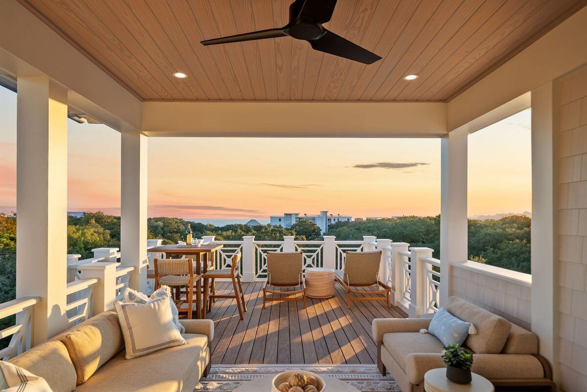 Where Coastal Luxury Meets Elevated Design:
This exceptional retreat in Old Seagrove seamlessly blends architectural sophistication with timeless coastal style. The 5,283 sq. ft. residence is offered fully furnished and showcases five bedrooms, including three primary suites, two guest suites, a bunk room, media room, and 6.5 baths.
Step through the grand entryway into a light-filled foyer with soaring 12-foot ceilings, setting the tone for the remarkable design within. The gourmet kitchen impresses with Wolf and Sub-Zero appliances, a stone slab backsplash carried all the way to the ceiling, and a generous island perfect for entertaining. The kitchen flows seamlessly to a sitting area and open living room, continuing into a grand dining space just steps from your private wine storage. Completing the first floor is one of two primary suites, adorned with custom cypress ceilings and a spa-like bath.
The second floor welcomes you with a spacious landing that leads to a second primary suite with tranquil, spa-inspired finishes and separate soaking tub, an additional guest suite, a media room, bunk room, and an oversized screened porch tucked beneath the oaks  the perfect retreat for coastal evenings.
On the third floor, a secondary living space awaits  complete with a built-in beverage center for effortless entertaining  connecting to a third primary suite option, an additional bedroom, and an expansive outdoor terrace. As you ascend to the fourth floor, you're greeted by an abundance of natural light and a dramatic chandelier, leading to the rooftop deck  a show-stopping perch above the treetops, offering panoramic Gulf views and sweeping coastal vistas.
Designed for indoor-outdoor living, the home features over 1,000 sq. ft. of porches, a private pool and spa, elevator, and wide-plank oak flooring throughout. Every finish and fixture reflects a commitment to quality and sophistication.
Perched on one of Old Seagrove's highest natural elevations  rising 40 feet above sea level  the property offers a rare vantage point with Gulf breezes, serene views, and convenient access to Seagrove's sugar-white sands. Residents enjoy plenty of room to unwind and take in the emerald waters of the Gulf.
In collaboration with NOLA 30A, Fox Construction, Stackable + Mracek, and Design and Dwell, this home represents a masterclass in coastal design, crafted for those who appreciate artistry, architecture, and effortless living.
