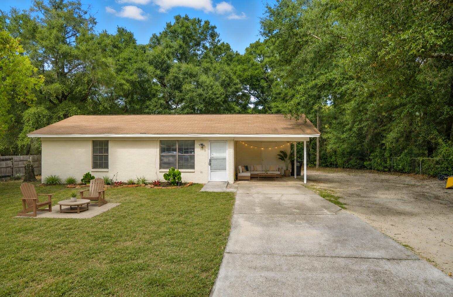 Why rent when you can own? This fully updated brick home sits on nearly one-third of an acre and offers the rare combination of affordability, modern finishes, and a huge backyard. Fresh paint inside and out, new flooring, granite countertops, and move-in-ready condition make this one of Crestview's best values. Whether you're buying your first home, downsizing, or adding to your investment portfolio, this property checks all the boxes. Some of the listing photos have been virtually staged to help illustrate the home's potential. The furnishings, décor, and design elements shown are digitally added for inspiration and to help buyers envision how the spaces can be used. These images are intended for marketing purposes only. The home is being sold as shown in the unstaged photos, and no furniture or décor depicted in the virtually staged images is included with the sale.