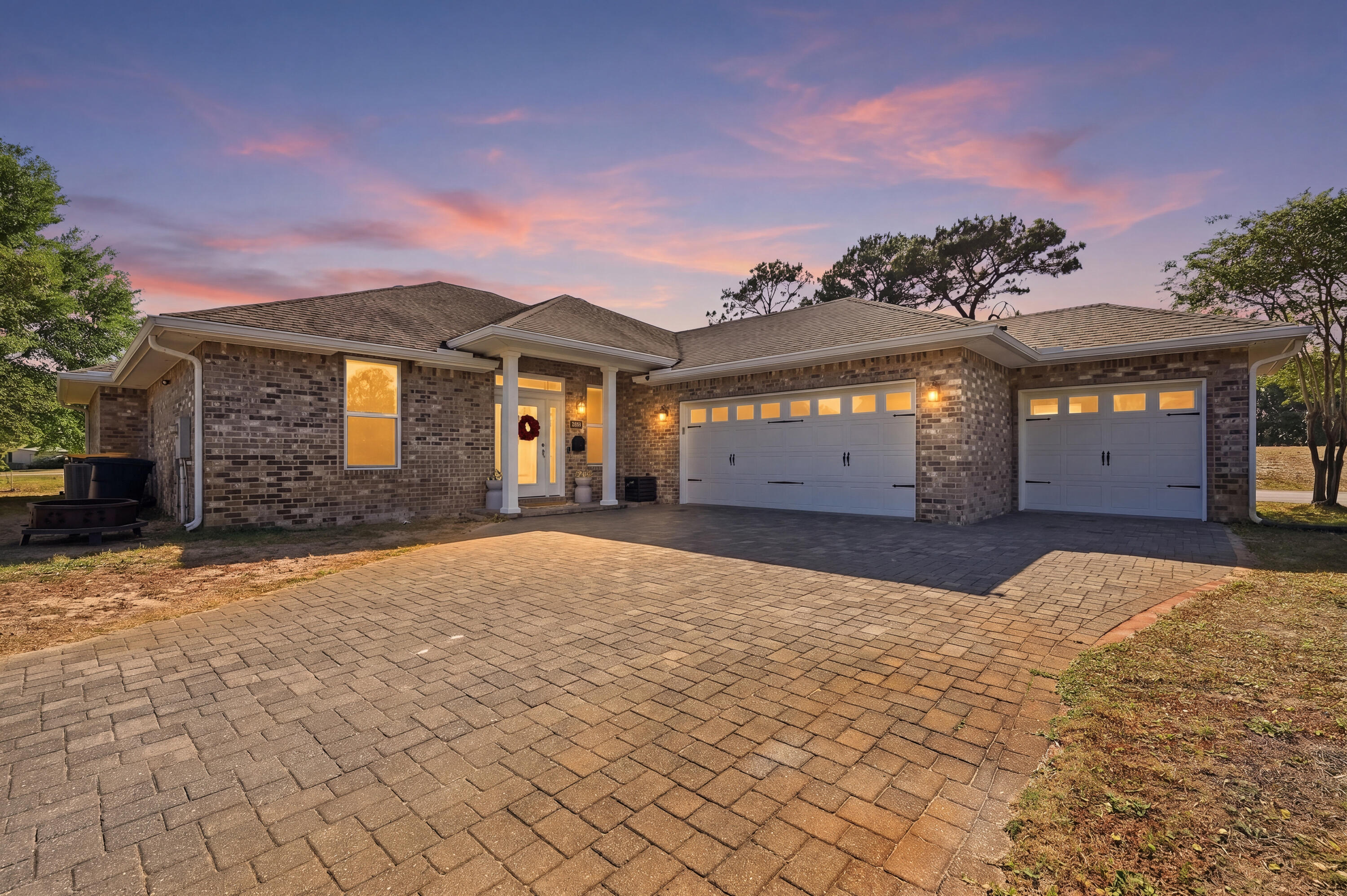 2.75% VA Assumable available. Custom, INSULATED CONCRETE FORM home located waterfront on The Links golf course. JUST painted and then custom blinds installed 2025. This is a one of a kind home with unique contemporary features. Split floor plan. Large formal dining or office area, living room, kitchen with built in desk and eat in area that is large enough for your main dining. Bar seating. New top of the line appliances. Master suite has separate entrance to the screened back porch, overlooking the lake. His and Her closets, Large tiled shower, separate soaking tub with waterfall fill feature. Laminate hardwood and tile throughout. Laundry room has plenty of storage with mud bench and custom built ins and cabinets. Oversized garage with paver drive. Blinq cameras and doorbell will convey.