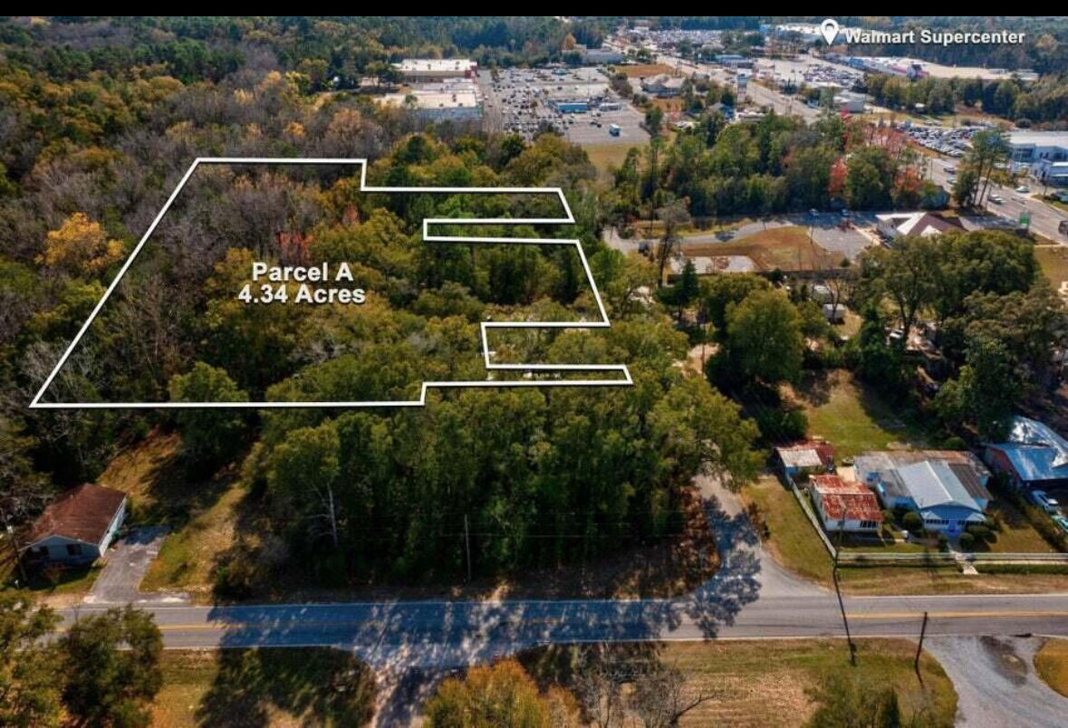 Seller offering up $3500k towards buyers closing costs or anyway money. Seller said bring all offers! This is a great opportunity to own acreage in Defuniak City Limits, On a paved road,  Located approximately 1 mile to Walmart, Lake Defuniak and I10 (exit 85). 
Build your dream home or have it rezoned to build your office, retail space or multi family home. The possibilities are there.
Utilities to include electric,  water and sewer at road side. See survey in documents.
Buyer to verify land use and development restrictions. Don't let this one get away, call and make your showing appointment today!