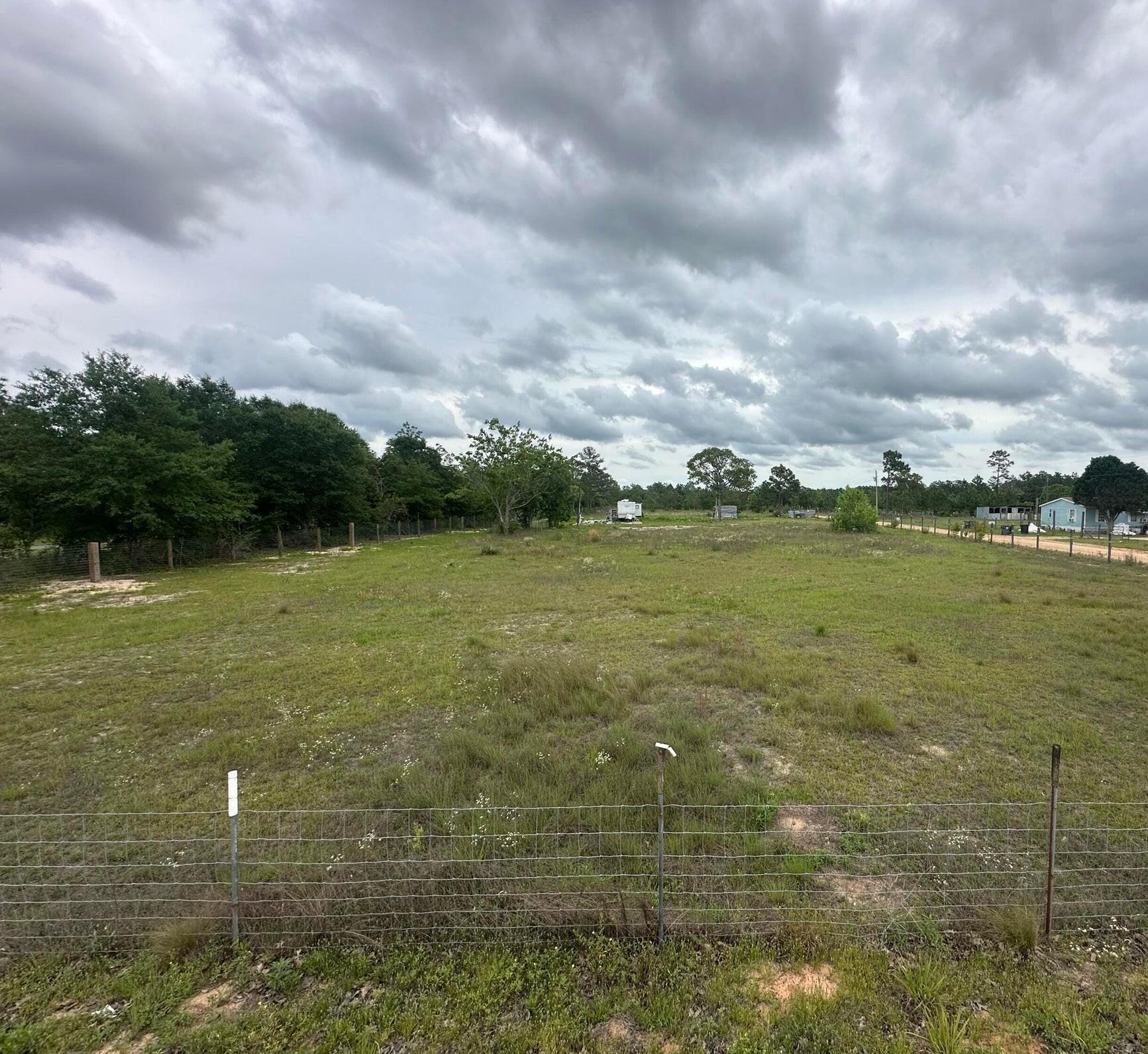 Looking for a chance to own some property in North Walton County? This lot might be just what you are looking for! At two and quarter acres, this lot would make a perfect place to build your forever home and offers enough space to build a barn, have some livestock, or whatever your heart desires. Located within a ten-minute drive to DeFuniak Springs and a hour to the beaches of South Walton. Lots of this size are a rare find these days. So come take a look and see if this lot is what you have been looking for!

Has an old well on the property, but the pump has been stolen/removed, so unknown on the integrity of the well. The lot also has a power pole with power ran to it, but the meter box is damaged/inoperable. Will need a new meter box. Also, an old camper was left on the property, but no value is given to the camper.