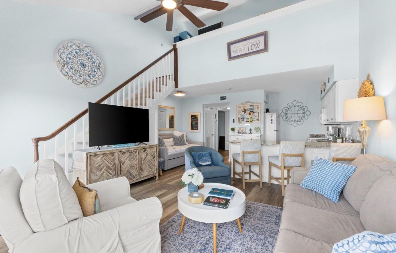 Experience the relaxing 30A lifestyle in this charming coastal retreat just steps from the Beach on the south side of 30A. This top floor condo perfectly balances cottage ease with a light-filled, open floor plan with dramatic 18 ft ceilings that immediately elevate the sense of space and loft area. Updated with built-ins, a new staircase with storage underneath, plank flooring, granite countertops in the kitchen and new appliances. The bathroom has also been completely updated. Unit 302 is sold fully furnished, making it a seamless transition for those seeking a vacation getaway or an  investment property.

Step onto the private balcony facing due south and soak in  the serene coastal lake to the left, Gulf views straightaway and sparkling heated pool below. When you're ready for the sand and surf, the public beach is a mere 450 ft from your door, putting the sugar-white dunes and emerald waters just steps away. It truly is a stunning sight that never gets old and always amazes.  

Ownership here also comes with peace of mind. The building recently underwent significant capital improvements including a new roof, Hardie board siding, and a new elevator.

The amenities cater to total relaxation offering a heated pool, hot tub, covered pavilion, grilling area, grassy dog walking spots, bike storage, golf cart charging stations, and a laundry area. Whether expanding your rental portfolio or finding your own slice of Seagrove Beach, this top floor unit delivers the quintessential coastal Florida experience south of 30A.

What sets Beachfront 2 is that the beach used is an actual public beach vs a public beach access.  A public beach access is simply a designated path or entrance that gets you to the sand, while a public beach is the actual stretch of sand and where anyone can legally lounge, walk and swim all day without restrictions.  Food for thought and definitely an advantage to beachgoers.