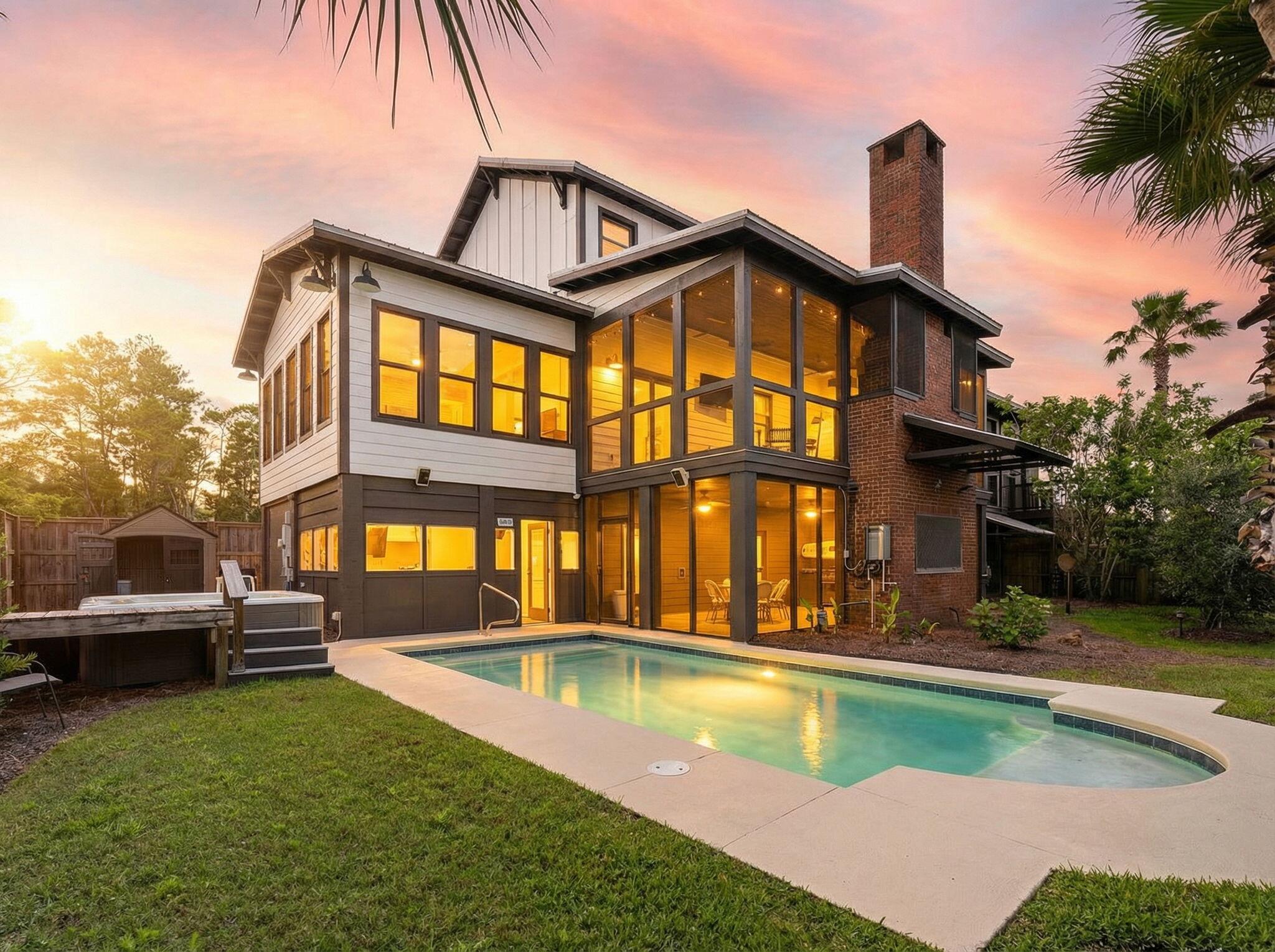 Tucked away on a private corner lot in coveted Gulfview Heights, this River Camp-style retreat sits just moments from Scenic 30A and the sugar-white sands of the Gulf. Thoughtfully designed across three stories, this 3-bedroom, 3.5-bath home offers generous living space and a blend of reclaimed craftsmanship and coastal construction.

Interior finishes showcase reclaimed materials throughout: pecky cypress walls, pine flooring and cypress cabinetry from the Choctawhatchee River, countertops and shelving from a century-old North Carolina barn, and antique brick reclaimed from early 1900s Chicago.

Open concept living areas are warmed by two gas cast iron stoves capable of heating the entire home. The kitchen is well appointed, custom closets run throughout, and the primary suite features a walk-in closet, double vanity, and whirlpool tub. A flexible bonus room off the pool, featuring its own AC unit, works beautifully as an office, bunk room, or guest retreat, and a tankless water heater serves the downstairs level.

Outside, a saltwater, electric-heated pool anchors a private backyard complete with a downstairs summer kitchen, BBQ area, outdoor shower, covered decks, and expansive screened porches that invite the outdoors in. Lush, mature landscaping surrounds the home, offering privacy, shade, and a true coastal garden feel.

The conditioned 5 car garage offers heavy duty carriage doors with Franklin openers, an attached workshop, enclosed golf cart storage, and ample driveway parking.

Just minutes to Gulf Place, Ed Walline Beach Access, Goatfeathers, and the dining and shopping along 30A. Inquire today to schedule your private showing.