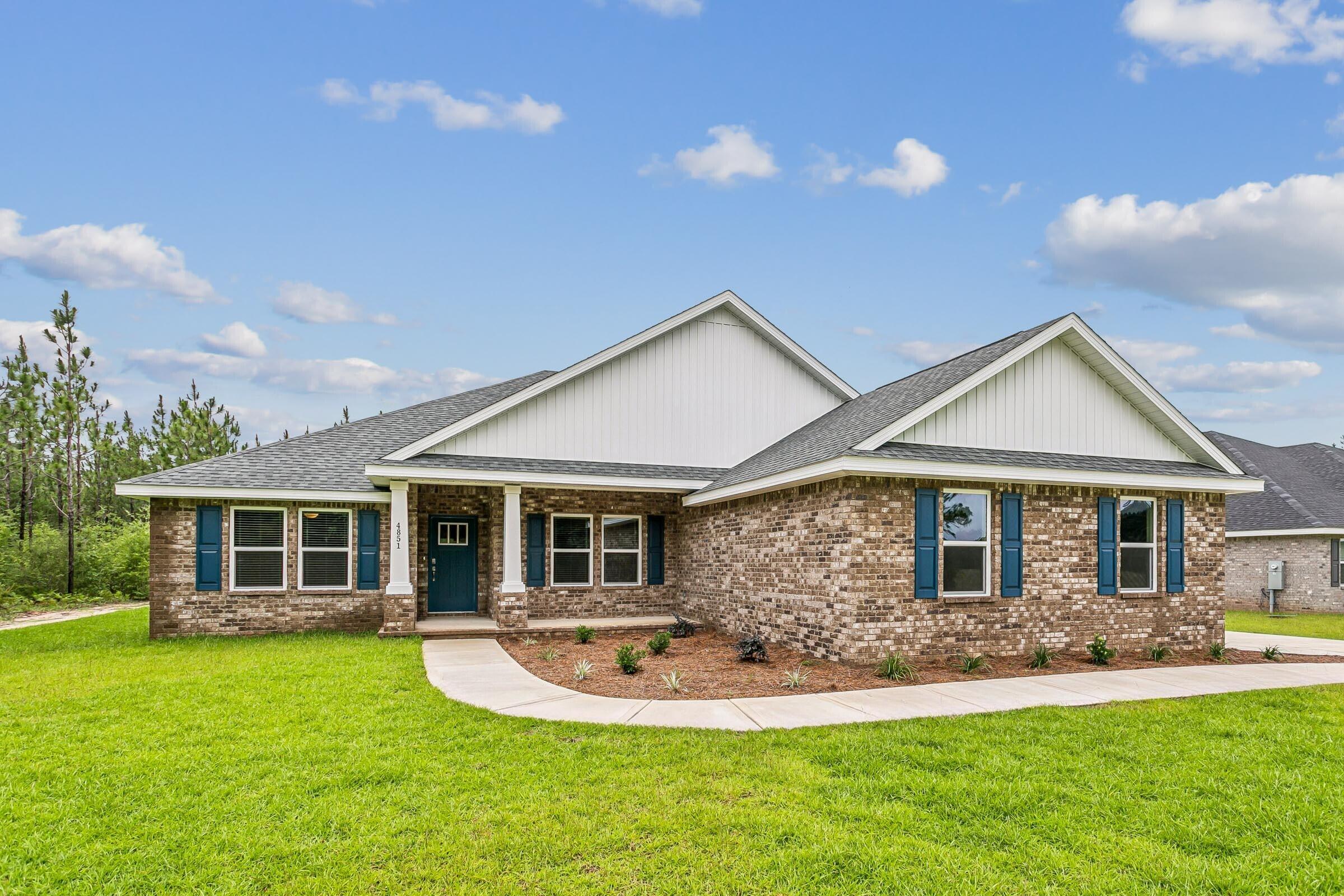 Welcome home to your new country estate for laid back living with all the conveniences of a modern, wonderfully built home. This stunning Sapphire Estate Floor Plan is situated on a .48 acre lot in the Prosperity Point community in Milton. Offering 4 bedrooms, 2 full bathrooms, and 2,404 square feet of beautifully designed living space, this home blends modern convenience with spacious country charm. The homesite is tucked away in a quiet, low-traffic street surrounded by nature, providing the perfect backdrop for privacy and peaceful living. Inside, the home showcases Herbst Homes' signature quality and attention to detail, with upscale features throughout. You'll find high-end cabinetry, granite or quartz countertops, and premium finishes that elevate every space. The kitchen is equipped with stainless steel appliances, under cabinet lighting, soft close cabinets, a walk-in pantry, all designed for both function and beauty.
Additional upgrades include a whole-house blinds package, crown molding in the common areas, and durable luxury vinyl plank flooring. The spacious, split-bedroom layout includes a luxurious primary suite with a tray ceiling, tiled walk-in shower, garden tub, double vanities, and a generous walk-in closet. A side-entry three-car garage elevates curb appeal with a clean, upscale look while providing ample space and functionality. This home has it all!
Pictures are of a similar home, colors may vary. Projected completion is October 2026.