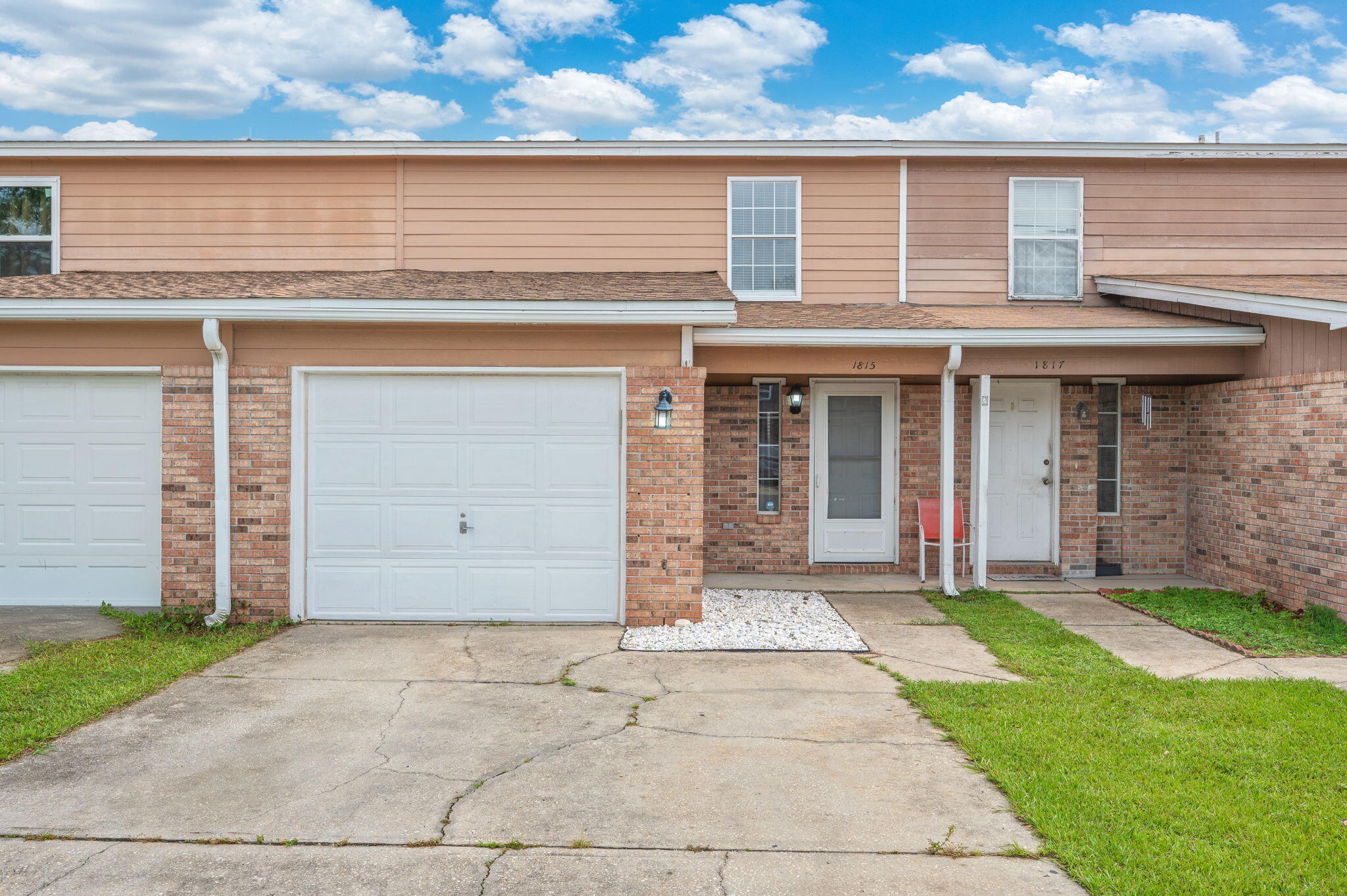 | NEW ROOF & HVAC 2022 | GRANITE COUNTERTOPS | NO HOA | GARAGE | LUXURY VINYL PLANK FLOORS | 

Welcome to this beautifully updated, turn-key townhome in the heart of Fort Walton Beach. Location is everything, and this rare property puts you minutes from the best of the Emerald Coast, combining low-maintenance living with the freedom of no HOA fees. Spanning 1,511 square feet, this spacious 3-bedroom, 2.5-bath home is one of the larger townhomes in the subdivision. Major mechanical improvements provide lasting value and peace of mind, including a new roof and HVAC system installed in 2022. Whether you are searching for a move-in-ready primary residence or a high-yield investment property, this home is ready for its next chapter.

Step inside to a bright, open-concept layout where luxury vinyl plank flooring extends throughout. The spacious kitchen flows seamlessly into the dining and living areas, creating an ideal space for everyday living and entertaining. Premium upgrades include granite countertops, a stylish tile backsplash, a center island with breakfast bar seating, and a deep stainless-steel sink. The kitchen comes fully equipped with a stainless-steel range, dishwasher, and microwave, all new in 2023 and refrigerator. Modern fixtures, new energy-efficient LED light fixtures, and a conveniently located half bath complete the downstairs space.

Upstairs, you will find three spacious bedrooms and two full bathrooms.  The primary suite features a spacious room with new stylish led light and fan as well as a private en-suite with bathroom updated with premium granite countertops, new sinks and plumbing fixtures. The two additional bedrooms feature new stylish ceiling fans to keep the spaces cool and comfortable. The hall bathroom has been tastefully updated with premium granite countertops, newer sinks, and modern plumbing fixtures, adding a cohesive, upscale feel throughout the home.

Outside, the home features a private driveway leading to a one-car garage for secure parking and extra storage. The backyard offers a cozy patio and a privacy-fenced outdoor space complete with a secure gate, creating the perfect setting for relaxing or grilling. Enjoy a quick commute to both Hurlburt Field and Eglin AFB, effortless access to the shopping and dining corridor along Beal Parkway, and a short 7-mile drive to local white-sand beaches. This move-in-ready townhome is also just around the corner from a public golf course and the University of West Florida Fort Walton Beach campus. Come see it Today!