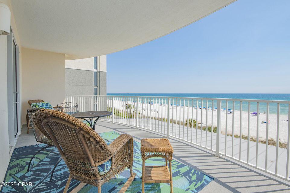 Welcome to your dream coastal getaway in the heart of Panama City Beach! This stunning 2-bed, 2-bath end unit in the sought-after Twin Palms condo building offers unbeatable views of the Gulf of Mexico from a spacious wrap-around balcony--perfect for watching dolphins play in the surf or catching one of those famous Florida sunsets. Located on the 4th floor with open parking just steps from your front door, this unit combines convenience, comfort, and privacy. Skip the busy elevators--you're only four flights of stairs from the sand and surf! Inside, you'll find a well-maintained, beachy retreat with an owner's closet, ideal for storage or making this your part-time home. The trash chute is located on the opposite end of the hallway, keeping foot traffic minimal and your environment peaceful. This unit is rental-ready, generating $32,000 in gross rental income last year--and that's with the owners enjoying it for monthly stays! Imagine the potential. You'll love the easy walk to nearby restaurants, museums, and entertainment, with Walmart just a minute's drive away. When you're not relaxing on the balcony or on the beach, enjoy the resort-style amenities including a beachfront pool, hot tub, sauna, and more. Whether you're looking for an income-producing investment, a personal beach retreat, or a bit of both, this condo delivers. Come experience why Panama City Beach is home to the world's most beautiful beaches, where turquoise water meets sugar white sand.
