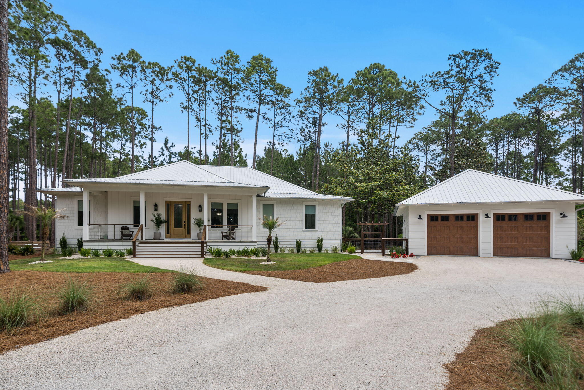 Tucked along a serene .79-acre homesite in one of Panama City Beach's most coveted gated communities, this impeccable 2024-built home with 3 bedrooms, 2 baths, home office and fully-insulated, heated and cooled 2-car garage was truly made for living. From the moment you arrive, every detail has been curated with intention, blending modern coastal elegance with craftsmanship that does not cut corners. Every inch of this home is custom and truly stands out amongst all others. 

Rare, single level living in RiverCamps has never felt this elevated. Ten foot ceilings in the main living areas give way to a dramatic vaulted living room anchored by rich oak beams, while coffered ceilings in the dining room add architectural warmth. White oak engineered floors flow seamlessly throughout and designer lighting sets the tone. A 12-foot, three-panel sliding door opens fully to a 40-foot screened porch overlooking the natural beauty of the Florida Panhandle, where deer are often seen in the backyard.

Built for performance, the home includes a whole-house generator, whole-house surge protector, tankless water heater, 250-gallon propane tank, Peel and Seal underlayment, Galvalume gutters with full drainage and foam insulation throughout. The detached garage features epoxy floors, beadboard walls, extended height 8-foot, insulated doors and attic access. This thoughtfully designed single-story home also features 3-foot-wide doorways, a seamless roll-in shower and a gently sloped entry ramp, all integrated with clean, modern finishes so the accessibility features feel like intentional design choices rather than an afterthought allowing you to enjoy life in your home for many years.

Smart home features include fiber internet, hardwired connections in every room, USB-C outlets, smart thermostats/dimmer lighting/appliances/security system and overhead reading lights in each bedroom. It's truly what's behind the walls in this home that are designed for living for years to come!

The kitchen is a true showpiece. A custom Venetian plaster range hood anchors the space above a professional LG and KitchenAid Pro Line appliance suite, complemented by a full height stone backsplash, Level 5 quartz countertops, Emtek hardware, Brizo plumbing fixtures, pot filler, glass rinser, appliance garage and maple floating shelves. A custom full height pantry with soft close drawers and butcher block countertop keeps everything organized. This space is designed for both everyday living and entertaining.

The private home office features 9-foot glass pivot doors, offering separation while maintaining an open feel. Three bedrooms, two baths and a well designed mudroom with built ins, bench seating and a custom dog wash station complete a thoughtful and functional layout.

The primary suite is a true retreat with a sitting area, fireplace and custom maple built in wall unit. The walk-in closet is a fully custom, solid wood system with natural light. The ensuite bath features a steam shower and sauna with LED lighting, a freestanding tub on a pedestal, fossil limestone flooring and marble mosaic tile with stone hardware throughout.

RiverCamps offers a lifestyle unlike any other and spans across more than 1,500 acres. Amenities include a resort-style pool with lap lanes and cabanas, complimentary boat storage (hello, savings!) and launch, creek access with slips, kayaks and paddleboards, a pier, pickleball courts, stocked fishing ponds, fire pit gathering area and over 15 miles of scenic trails. The RiverHouse, social lounge, community events and campground create a true sense of community. A new fitness center is expected Fall/Winter 2026.

6331 Turkey Cove Lane is move in ready, meticulously maintained and offers a rare combination of custom design, quality and lifestyle. A full list of features and benefits available by request. Schedule your private tour today!