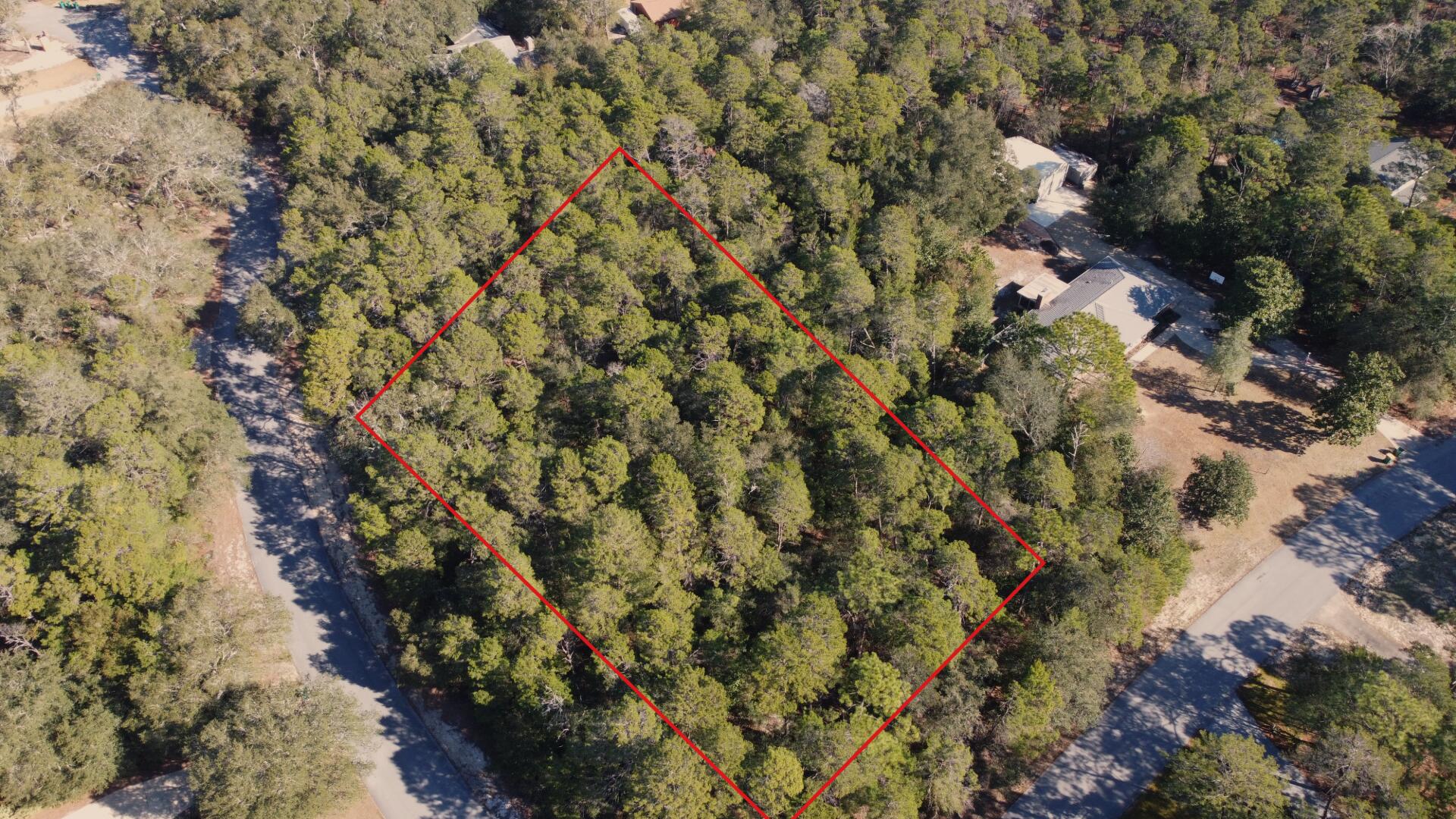 Beautiful lot in Bluewater Bay neighborhood of Niceville.  Discover the perfect canvas for your dream home on this expansive 1.4-acre corner lot, ideally situated near Destin, FL, and Eglin AFB. This prime residential lot offers endless possibilities, whether you're envisioning a spacious family home, a barndominium, a shop, mother-in-law quarters, or a luxurious pool and pool house. The generous size provides ample space for your creative vision to flourish. Seize this rare opportunity to create a bespoke retreat, perfectly positioned for convenience and tranquility. Embrace the potential and build your dream lifestyle in this sought-after location! You can NOT split this lot. The covenant restriction allows one residence on this parcel.