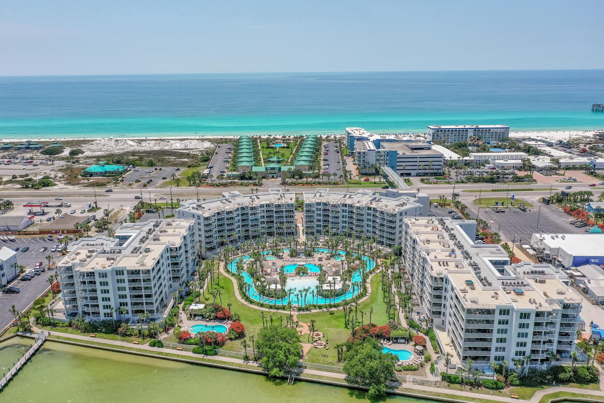 Some vacations end when you check out. Others make you wonder what it would be like to never leave.

Welcome to Sandpiper L05 - one of Destin West Beach & Bay Resort's most coveted floor plans--a rare ground-floor lanai unit with private walk-out access to the resort's signature lazy river and tropical pool oasis. No elevators. No hallways. Just step outside and you're already floating.

Even more unique, lanai units are the only residences at Destin West with an attached private one-car garage--an amenity few Emerald Coast condominiums can offer.

Sold fully furnished and turnkey, Unit L5 features one bedroom and a bunk room; comfortably sleeping up to seven. Featuring newer appliances throughout, it is ready for immediate enjoyment or continued vacation rental use.

Destin West spans both the bay and Gulf sides of Okaloosa Island, connected by a private pedestrian skybridge. Owners and guests enjoy access to seven tropical pools, a 700-foot lazy river, hot tubs, marina, charcoal grills, and the sugar soft -white sand beaches and emerald waters of the Gulf just a short stroll away.

Whether you're searching for a personal beach retreat, a proven short-term rental, or a 1031 exchange opportunity, Unit L05 offers a rare combination of lifestyle, location, and investment potential.