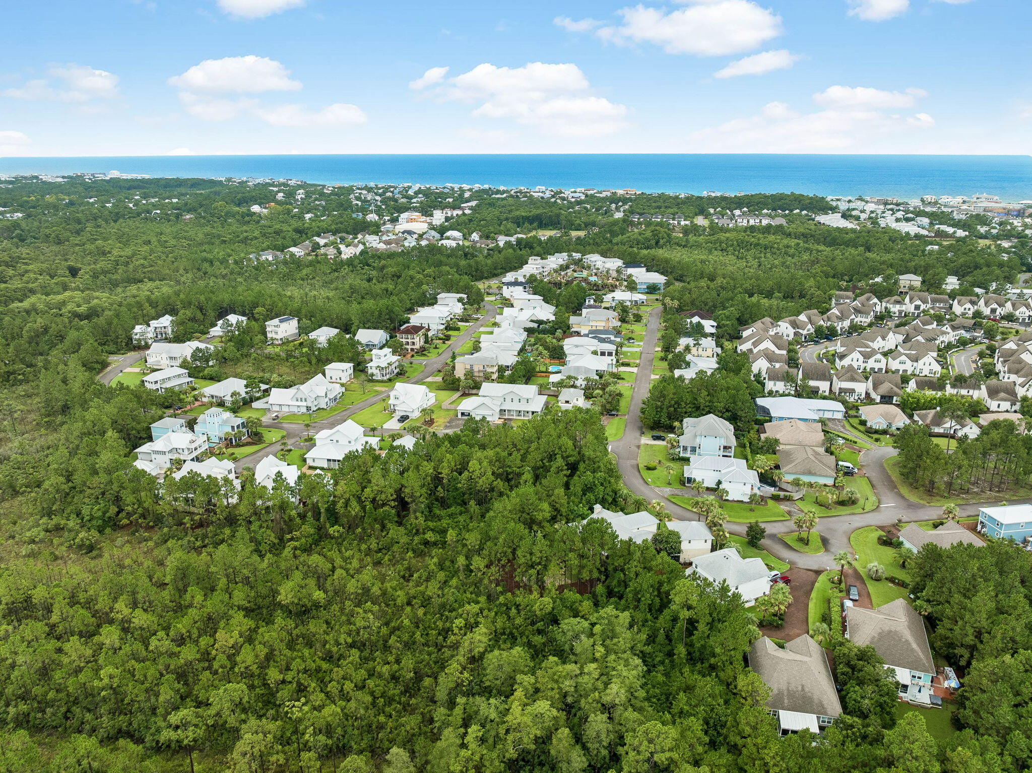 Discover the perfect setting to build your dream home on this exceptional 0.61-acre wooded homesite in one of Santa Rosa Beach's most desirable communities. This lot offers a rare combination of privacy, mature trees, and generous space, creating an ideal backdrop for a custom coastal retreat.

Located just approximately a half-mile from Gulf Place Town Center and the Ed Walline Regional Beach Access, you'll enjoy easy access to sugar-white sand beaches, local restaurants, boutique shopping, coffee shops, and live entertainment. Residents also have access to an expansive community pool, providing the perfect place to relax and unwind after a day at the beach.

Opportunities to own a homesite of this size in such a prime location are increasingly rare. Whether you're planning a primary residence, second home, or investment property, this lot offers the space, location, and lifestyle you've been searching for.