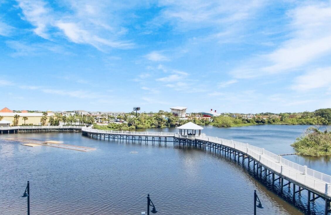 Laketown Wharf Resort: Perfectly located in the heart of Panama City Beach and just steps from the Gulf's pristine white sand and aqua water. This well-appointed condo features an open floor plan, private balcony, and beautiful views of the serene lake. This unit is completely remodeled! Located on the second floor, step into luxury and comfort with this contemporary  one-bedroom, two-bathroom condo. A cozy bunk area and a sleeper sofa ensure ample space for extra guests. Prepare meals and snacks in a  a fully equipped kitchen. Enjoy resort-style amenities including five pools, hot tubs, fitness center, lakefront boardwalk, and nightly fountain shows. Conveniently located near dining, shopping, and entertainment, this condo offers excellent rental potential or the perfect beach getaway.