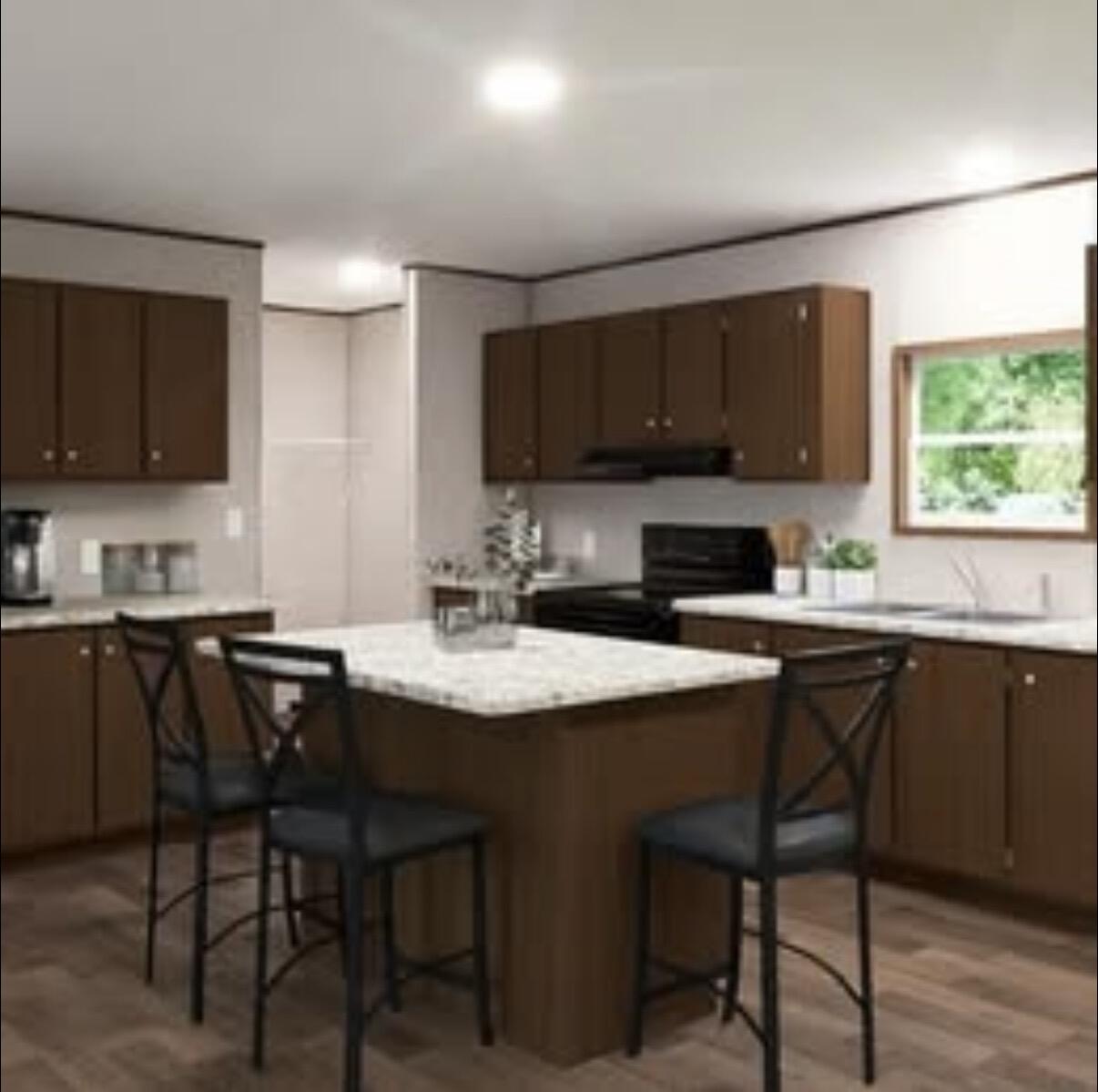 If you've been dreaming of your own little piece of heaven, this brand-new 2026 manufactured home is it!!! Offering 4 bedrooms, 2 bathrooms, and 1,971 square feet, this home sits on approximately an acre in a beautiful wooded setting with a cleared homesite. Inside, you'll love the open layout with two living areas and a kitchen with island that flows into the main spaces. The split bedroom design offers a private primary suite, while the additional bedrooms are on the opposite side of home. Enjoy that down-home country feel while being just a short drive to the beach and close to Pensacola, Eglin, Duke Field, and Whiting Field. Pics are taken from the manufacturers advertisement video of home. Home in to be delivered early May.