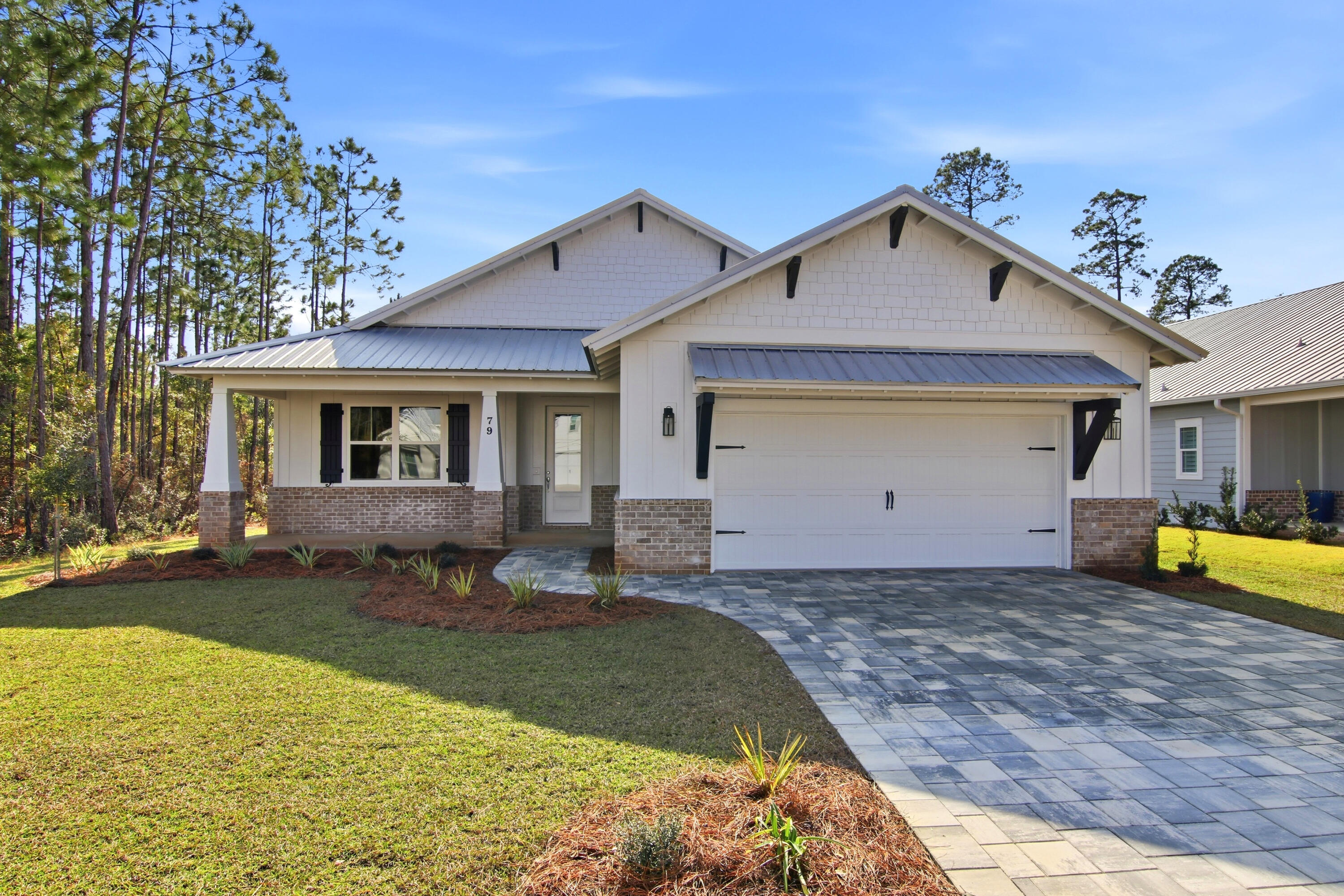 Beautiful new construction home! From the hints of shiplap, white washed tongue and groove in the tray ceilings and on the porches, to the beautiful LVP throughout; you will be impressed with the builder's design choices. The incredible kitchen is equipped with stainless steel in-cabinet microwave, oven, refrigerator, induction cooktop, large island with a pop of color, stunning granite countertops, tile backsplash and large pantry. The entire home has nine foot ceilings and eight foot doors. The primary is an absolute dream with an impressive en-suite bathroom and two large walk-in closets. You'll never have to argue over closet space again! Other features include an office, laundry room, coffee bar and an oversized two car garage. Buyer to verify any and all information deemed important.