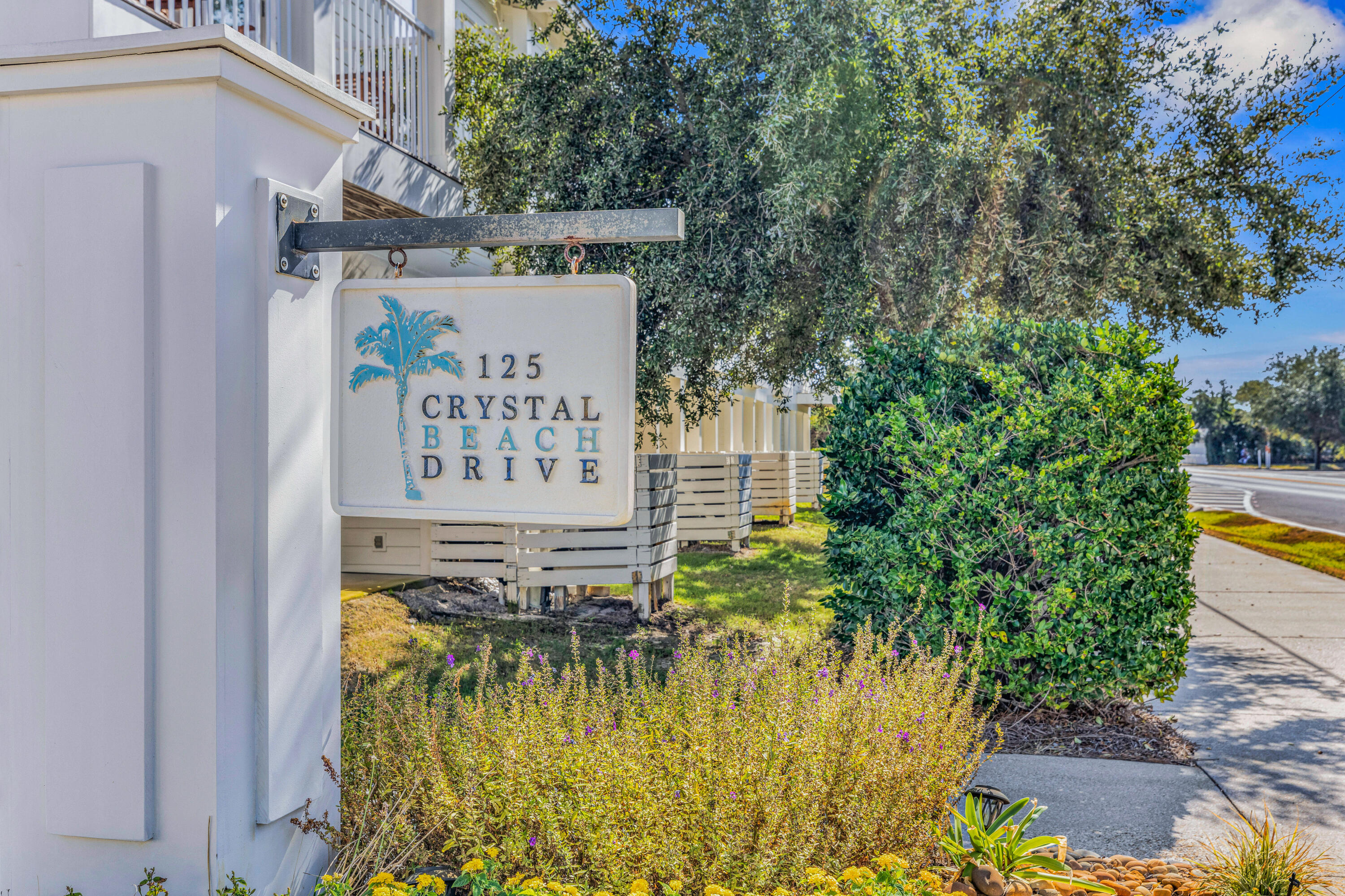 Welcome to the heart of Crystal Beach, where coastal charm meets effortless living. Whether you're searching for a proven vacation rental, a second home, or a full-time residence, this beautifully furnished, TURNKEY townhome offers the perfect combination of investment potential and everyday comfort. With a great rental history it's ready for your investment or is turn key for personal enjoyment, this property is ready to work for you from day one no matter your endeavor.

Ideally located in one of Destin's most desirable beach communities, you'll be just moments from the sugar-white sands of the Gulf, as well as Destin Commons, Whole Foods, premier shopping, restaurants, entertainment, bowling, and a movie theater. The community amenities include a resort-style pool, expansive green space, a dog park, and convenient beach access just a short stroll away.

Parking is plentiful with a private one-car garage that's perfect for storing a golf cart or beach gear, two dedicated driveway spaces, and additional guest parking nearby. Best of all, the community is VA approved, making this an outstanding opportunity for primary homeowners as well as investors.

Modern conveniences include a Wi-Fi-enabled smart lock and garage keypad, allowing for seamless owner and guest access. Inside, you'll find durable luxury vinyl plank flooring, ceramic tile, granite countertops, and tasteful coastal finishes throughout. The first floor features two well-appointed guest bedrooms, including a spacious king suite and a bunk room with a twin-over-full bunk, along with a full bathroom, laundry area, and garage access with additional storage. Both bedrooms open directly onto the rear patio, creating the perfect spot to relax after a day at the beach or providing easy access to the community dog park.

The private primary suite occupies the second floor and serves as a peaceful retreat with a spacious walk-in closet, dual vanities, and an upgraded walk-in shower.

Designed for gathering, the open-concept main living area features crisp white cabinetry, granite countertops, a large pantry, generous dining space, and an oversized peninsula with bar seating ideal for entertaining family, friends, or vacation guests. Step outside onto the expansive covered balcony overlooking the community pool--the perfect place to enjoy your morning coffee or unwind with an evening sunset.

Whether you're looking to expand your investment portfolio or embrace the laid-back Crystal Beach lifestyle, this exceptional townhome is ready to welcome you home.