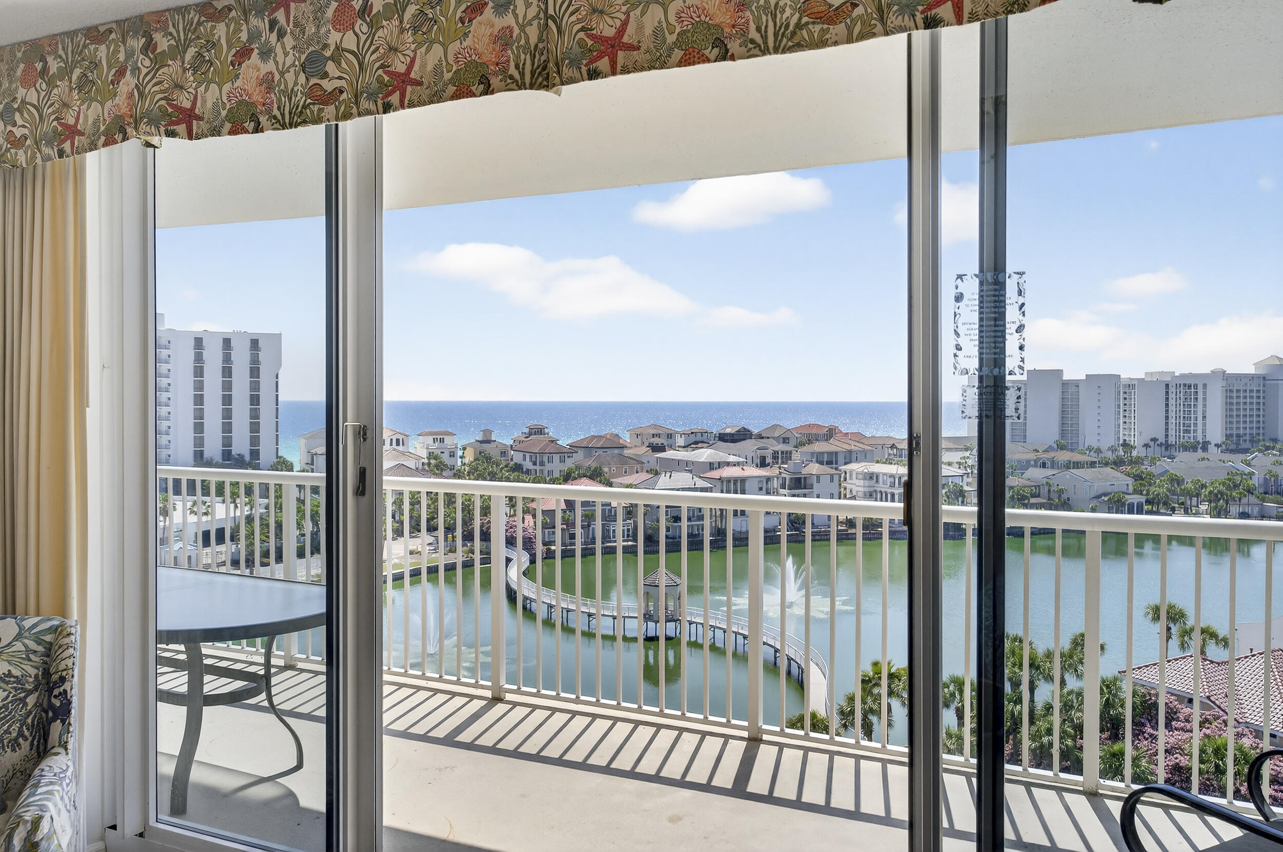 INCREDIBLE VIEWS from this 3 bed/2 bath condo.  The oversized balcony allows plenty of outdoor seating while enjoying the view. Did you know it's only a 1 minute stroll on the boardwalk to get to the private beach? That's right! This condo features the living area & master bedroom with balcony access, Nice size kitchen with a breakfast bar PLUS The flooring is ALL TILE - NO CARPET. Condo comes FULLY FURNISHED and other features include a stackable washer & dryer, nice size pantry and owner's closet. The Terrace is located in one of the most popular vacation complexes on the Emerald Coast. Terrace at Pelican has their own pool and grill area, and owners and guests at Terrace have unlimited use to all of Pelican Beach amenities including direct beach access, multiple beachfront pools (including indoor/outdoor options), hot tubs, indoor sauna & steam room, a fitness center, tennis courts, pickleball, on-site café and tiki bar, game room and security gate This condo makes it a great investment, second home or primary residence being in the heart of Destin.