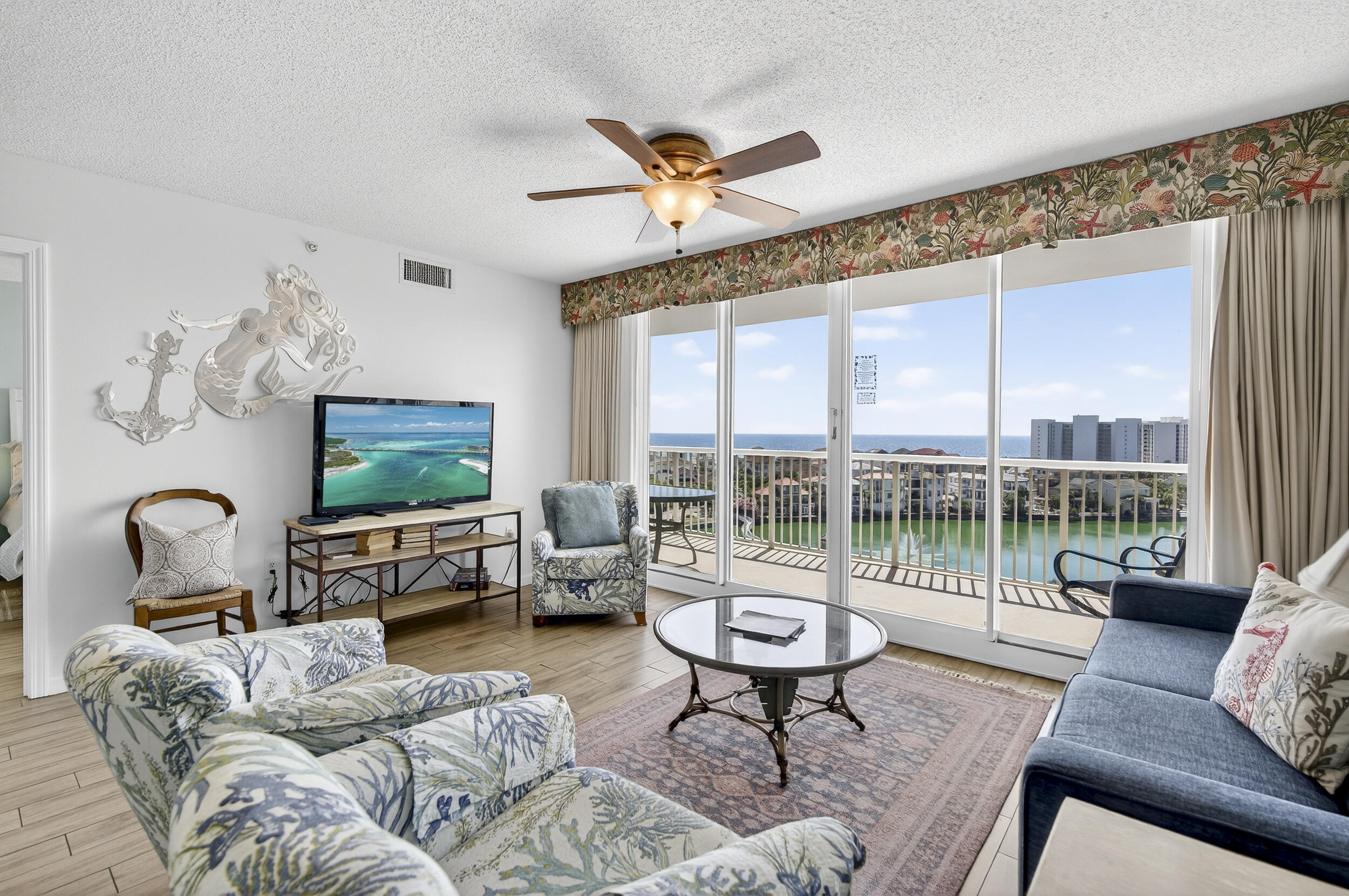 INCREDIBLE VIEWS from this 3 bed/2 bath condo.  The oversized balcony allows plenty of outdoor seating while enjoying the view. Did you know it's only a 1 minute stroll on the boardwalk to get to the private beach? That's right! This condo features the living area & master bedroom with balcony access, Nice size kitchen with a breakfast bar PLUS The flooring is ALL TILE - NO CARPET. Condo comes FULLY FURNISHED and other features include a stackable washer & dryer, nice size pantry and owner's closet. The Terrace is located in one of the most popular vacation complexes on the Emerald Coast. Terrace at Pelican has their own pool and grill area, and owners and guests at Terrace have unlimited use to all of Pelican Beach amenities including direct beach access, multiple beachfront pools (including indoor/outdoor options), hot tubs, indoor sauna & steam room, a fitness center, tennis courts, pickleball, on-site café and tiki bar, game room and security gate This condo makes it a great investment, second home or primary residence being in the heart of Destin.