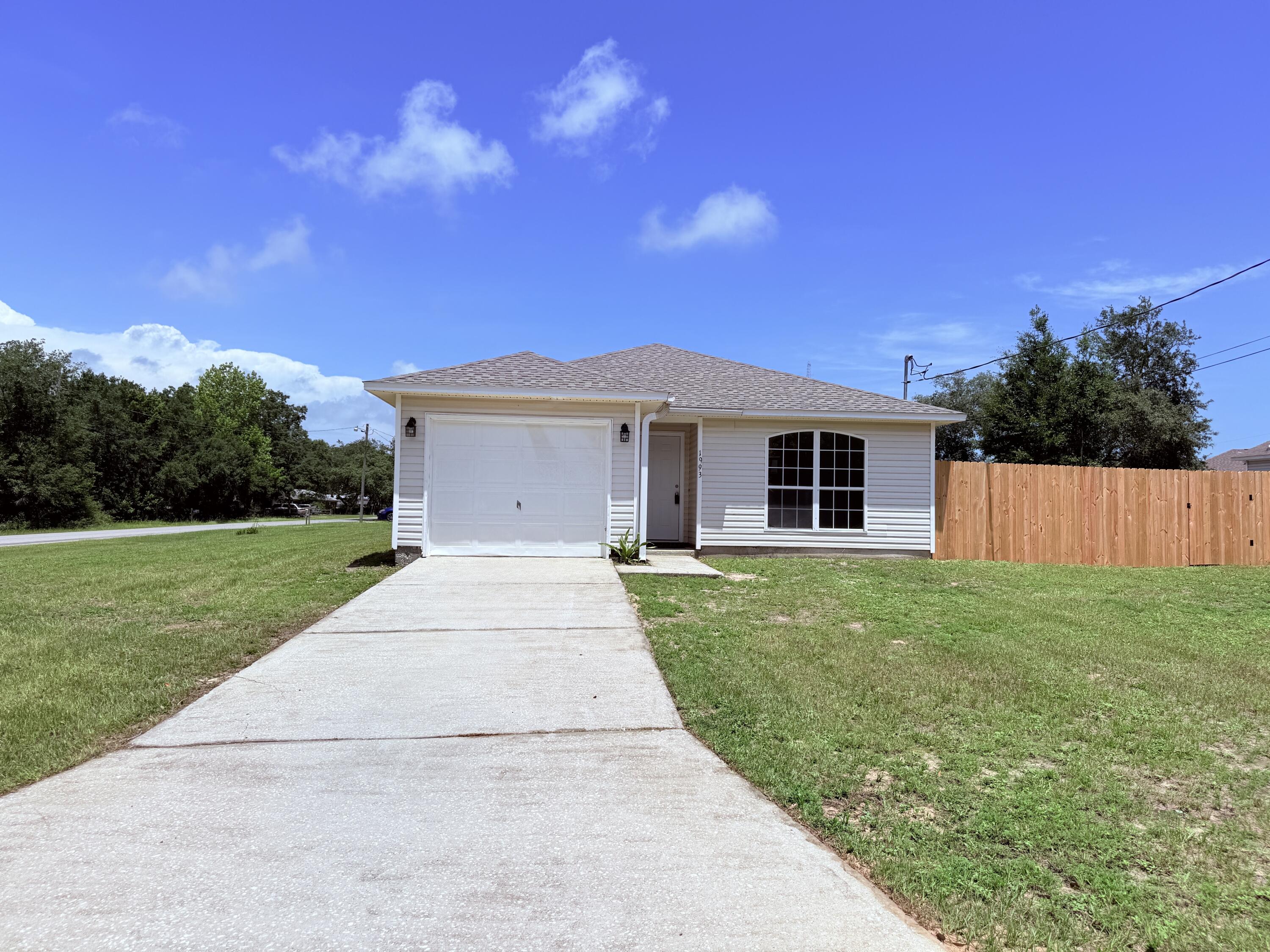 Completely Renovated with a BRAND NEW ROOF! Renovations are currently underway and are expected to be completed within 45-60 days. Conveniently located between Navarre and Gulf Breeze - a short walking distance to the new high school, this beautifully updated home features an open floor plan designed for modern living. ALL NEW: interior paint, rigid-core luxury vinyl plank flooring, carpet, fixtures, ceiling fans, appliances, cabinets, Quartz countertops, and more! The Spacious Family Room opens to the ALL-NEW eat-in kitchen with island, perfect for entertaining. Brand-new carpet has been installed in the bedrooms. The Primary Suite offers a fully renovated bath with new shower, double vanity, fixtures, toilet, and a large walk-in closet. The Guest Bath has also been completely updated with a new vanity, new tub/shower combo, and new toilet. Laundry is conveniently located INSIDE the home. The oversized 1-car garage is approximately 23 feet deep (lots of storage space!) and features a fresh concrete floor coating.  Outside, enjoy a privacy-fenced backyard with an open patio and a HUGE .28 acre CORNER LOT that allows for extra parking and easy back yard access. Additional updates include ROOF 2025, HVAC 2023 and a newer water heater. There is NO HOMEOWNER'S ASSOCIATION!  Please note: Exterior yard photos have been AI enhanced because the grass is currently patchy; however, the front yard will be 
re-sodded prior to closing. Call today to see this beautifully renovated home!