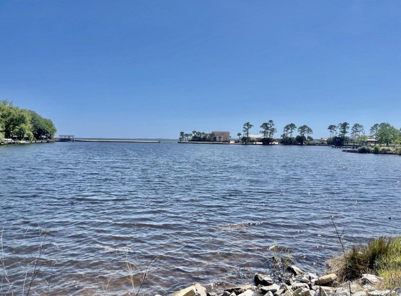 Zoned Suburban Residential with multi-family development potential for triplex or fourplex construction. Duplex with 2-bedroom, 2 full-bath units with spectacular views of Lake Vivian/Lake Clyde, the Choctawhatchee Bay, and Okaloosa Island on the horizon. New Roof completed in 2018. Unit A has a large screened-in porch with spectacular views of the lake. Unit A was completely remodeled in 2018, right down to the studs, with upgraded flooring, walls, updated appliances, new fixtures, and a newly replaced HVAC in 2017.Unit B features remodeled bathrooms, including an easy-access walk-in shower. Additional improvements include a new oven (2016), new water heater (2021), new HVAC system (July 2022), updated appliances, and LVP new flooring. A new 150-foot sewer line was installed on 4/2023. The County completed a project that elevated Meigs Drive in front of the property to improve drainage. Buyer to verify all measurements.