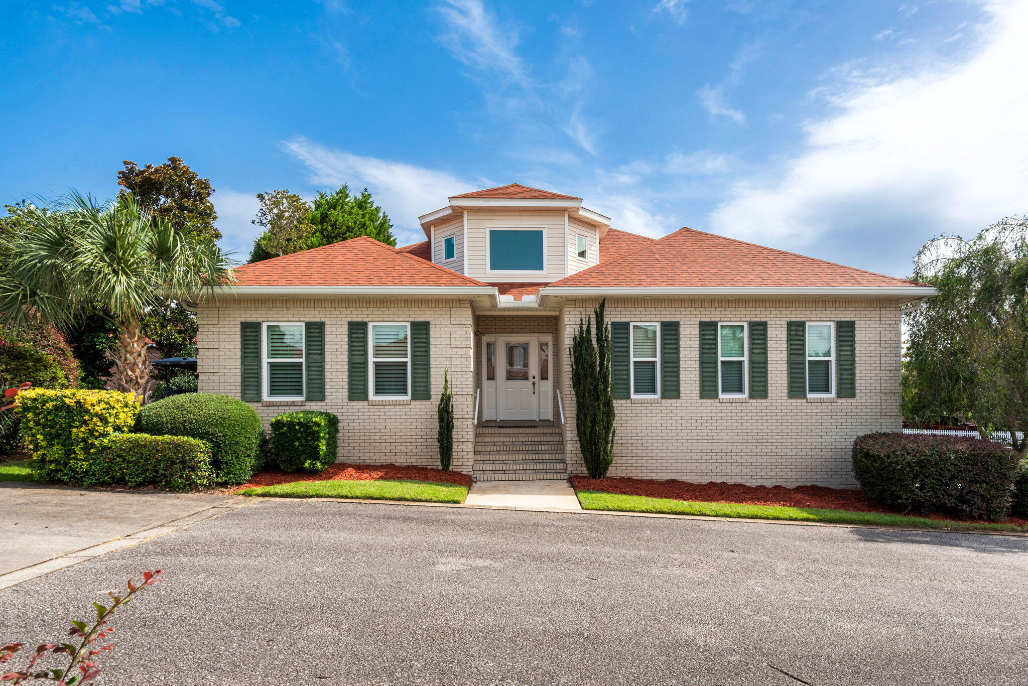 Custom-built beauty in the gated community of Magnolia Plantation at Mediterranean Village! Entrance hall opens to a Great Room with gas fireplace and hardwood flooring flowing into the Dining Room. Fully renovated 2018 kitchen boasts granite countertops, soft-close cabinets, LED lighting, and GE Café appliances with a 6-burner gas stove ($35K investment in kitchen/baths + new carpet with waterproof padding). Spacious Master Suite features a spa-like bath with double vanity, separate shower, and whirlpool tub. Two additional bedrooms share a full bath. French doors lead from the Family Room to a tiled Screen Porch and spacious concrete Patio -- ideal for entertaining. Fully fenced backyard with mature landscaping.