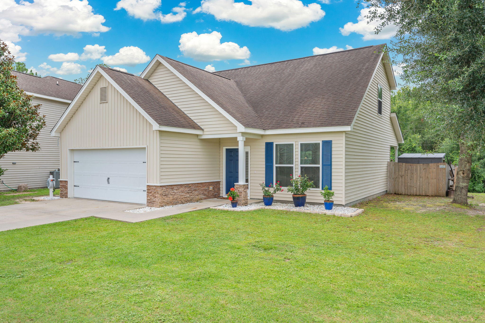 Conveniently located near Duke Field,  7th Special Forces Group, and Eglin Air Force Base, this beautiful home also offers the added bonus of being just a short drive from the Emerald Coast. Step inside to discover a spacious living room that provides the perfect space for relaxing or entertaining. The kitchen is sure to impress with granite countertops, gorgeous cabinetry, stainless steel appliances, and plenty of workspace for cooking and gathering.
The primary suite is thoughtfully located on the main floor, creating a private retreat complete with a custom walk-in closet and an en-suite bathroom featuring a double vanity and tub/shower combination. A convenient half bath is also located downstairs for guests. Upstairs, you'll find two additional bedrooms along with a loft area. 
Out back, unwind on the covered porch while overlooking the fully fenced backyard, perfect for morning coffee, evening relaxation, pets, or entertaining family and friends.