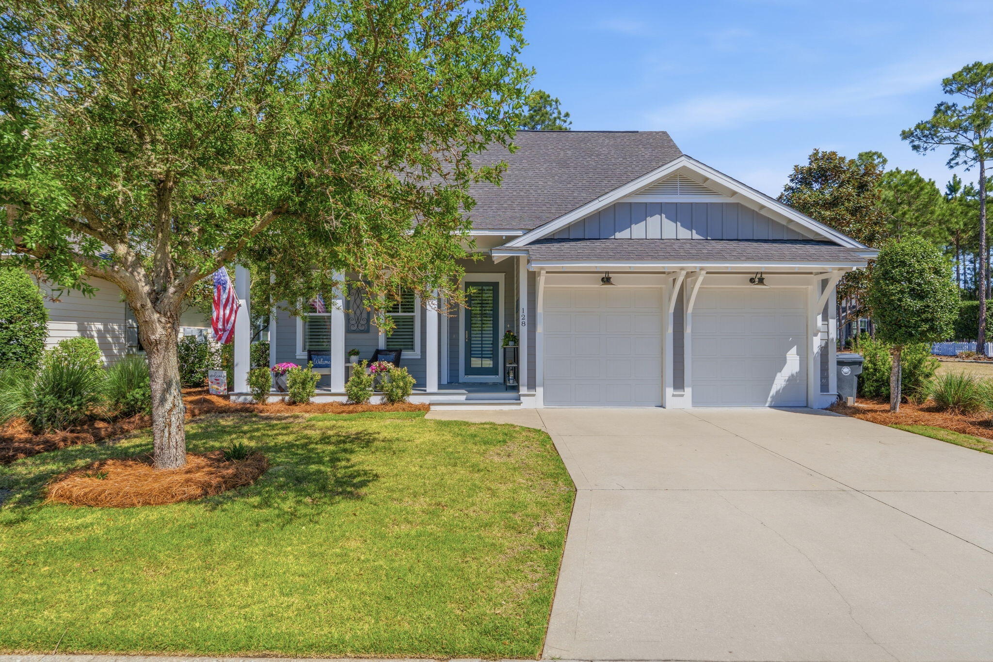 Welcome to 128 Jack Knife Drive, where elegant coastal living meets thoughtful design in the heart of Watersound Origins. Perfectly positioned alongside one of the community's most coveted green spaces, this home offers a rare combination of privacy, charm, and connection to everything that makes this neighborhood so special.

Built in 2016 and meticulously upgraded with over $100,000 in enhancements, this residence showcases a seamless blend of modern luxury and everyday functionality. From the moment you step inside, you are welcomed by an expansive open concept layout filled with natural light, soaring 10 foot ceilings, rich hardwood flooring, and plantation shutters that add warmth and sophistication throughout.

At the center of the home, the gourmet kitchen is both stunning and highl highly functional. Featuring an oversized quartz island with waterfall edges, seating for eight, stainless steel appliances, a gas vented range, extended countertops, and a custom dry bar, this space was designed for both entertaining and everyday living. A custom built window seat with storage adds an extra layer of charm and thoughtful detail.

The living room offers a comfortable yet elevated space to gather, enhanced by newly added sliding glass doors that open seamlessly to the outdoor living area. The first floor primary suite is a peaceful retreat, complete with a spacious walk-in closet, double vanities, and a walk-in shower. Newly added sliding glass doors in the primary suite create direct access to the porch, allowing for a true indoor and outdoor living experience.

Step outside to a show stopping backyard retreat. The custom designed 30 by 15 screened porch is built for year round enjoyment and features a full summer kitchen, retractable screens, a gas fireplace, and stationary heaters above the dining area for added comfort. Overlooking an expansive fenced yard, this space is perfect for hosting, relaxing, and making lasting memories. A whole house generator provides an added layer of convenience and peace of mind.
Additional upgrades include custom wood accent walls in the primary suite and living areas, along with high-end remote-controlled blinds on the front door, living room slider, back door, and primary bedroom slider, offering both style and flexibility.

Life in Watersound Origins is all about lifestyle. Residents enjoy access to Village Commons with a resort style pool, fitness center, playground, and sports courts, along with tennis, pickleball, and dock access on Lake Powell. The Origins Golf Course, recognized as one of the top par 3 courses in the world, offers a unique and beautifully designed golfing experience. Miles of walking and biking trails connect the entire community, creating a peaceful and active environment.
Just moments away, Watersound Town Center offers convenient access to dining, shopping, Publix, Starbucks, medical services, and a vibrant event pavilion with year round activities. With no short term rentals allowed, this community fosters a true sense of connection and belonging while still being just minutes from 30A and the white sand beaches of Inlet Beach.

128 Jack Knife Drive is more than a home, it is a lifestyle. A rare opportunity to enjoy luxury, comfort, and community all in one of South Walton's most sought after neighborhoods.

Schedule your private tour today and experience it for yourself.