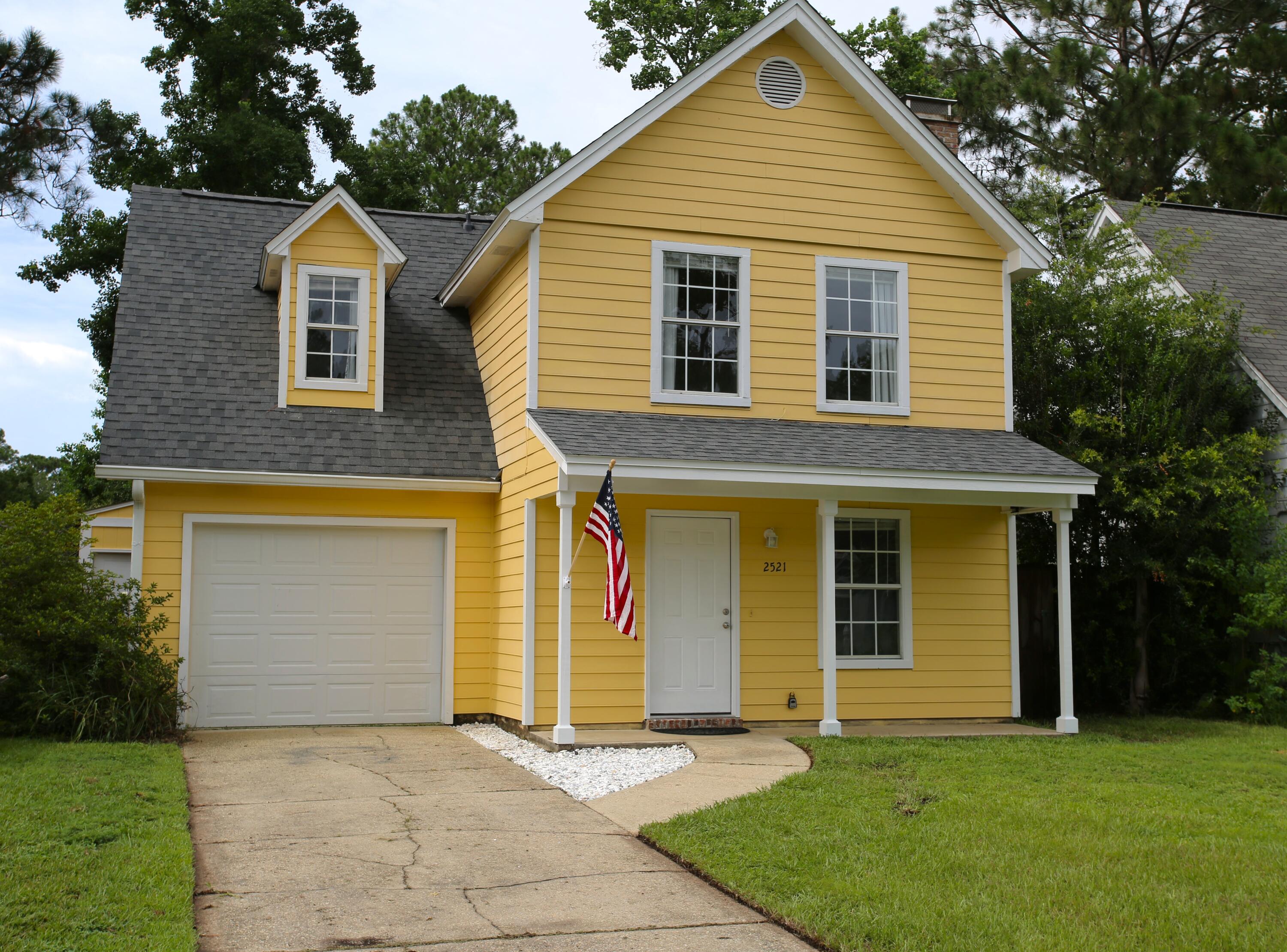 Welcome to 2521 Georgetown Lane in Fort Walton Beach! This beautifully updated two-story home is move-in ready and packed with upgrades that today's buyers are looking for.

Step inside to find fresh paint throughout, a fully remodeled kitchen, and updated bathrooms that give the home a modern, refreshed feel. The spacious living area features durable tile flooring and a cozy fireplace, creating the perfect space for relaxing or entertaining family and friends.

Upstairs, you'll enjoy the comfort of brand-new carpet, while the home's layout offers plenty of flexibility with 2 full bathrooms and 1 convenient half bath. Major improvements have already been completed, including a new roof, providing peace of mind for years to come.

Additional features include a one-car garage, a detached storage unit for extra space and organization, and a functional two-story floor plan designed for comfortable everyday living.

Conveniently located in Fort Walton Beach, this updated home combines style, comfort, and value in one attractive package. Don't miss your opportunity to make 2521 Georgetown Lane your new home!